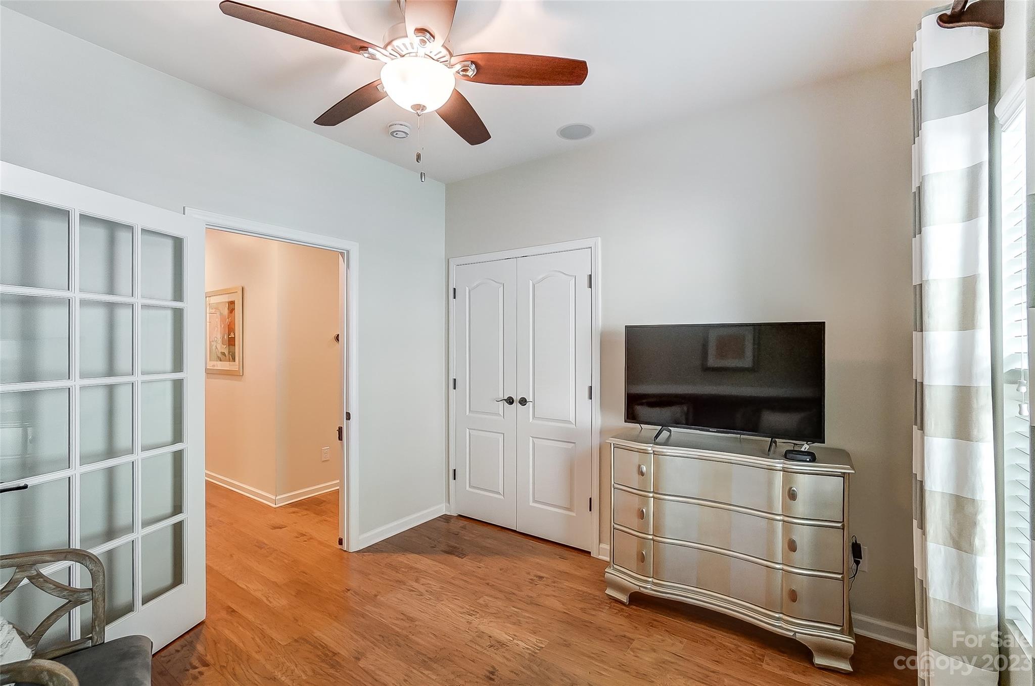 1719 Still River Way Fort Mill, SC 29708 - Photo 30 of 41 a view of a livingroom with wooden floor and a ceiling fan