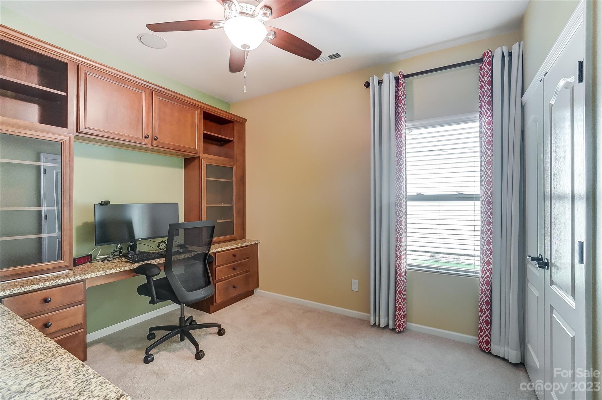 1719 Still River Way Fort Mill, SC 29708 - Photo 31 of 41 a view of a workspace with furniture and a window