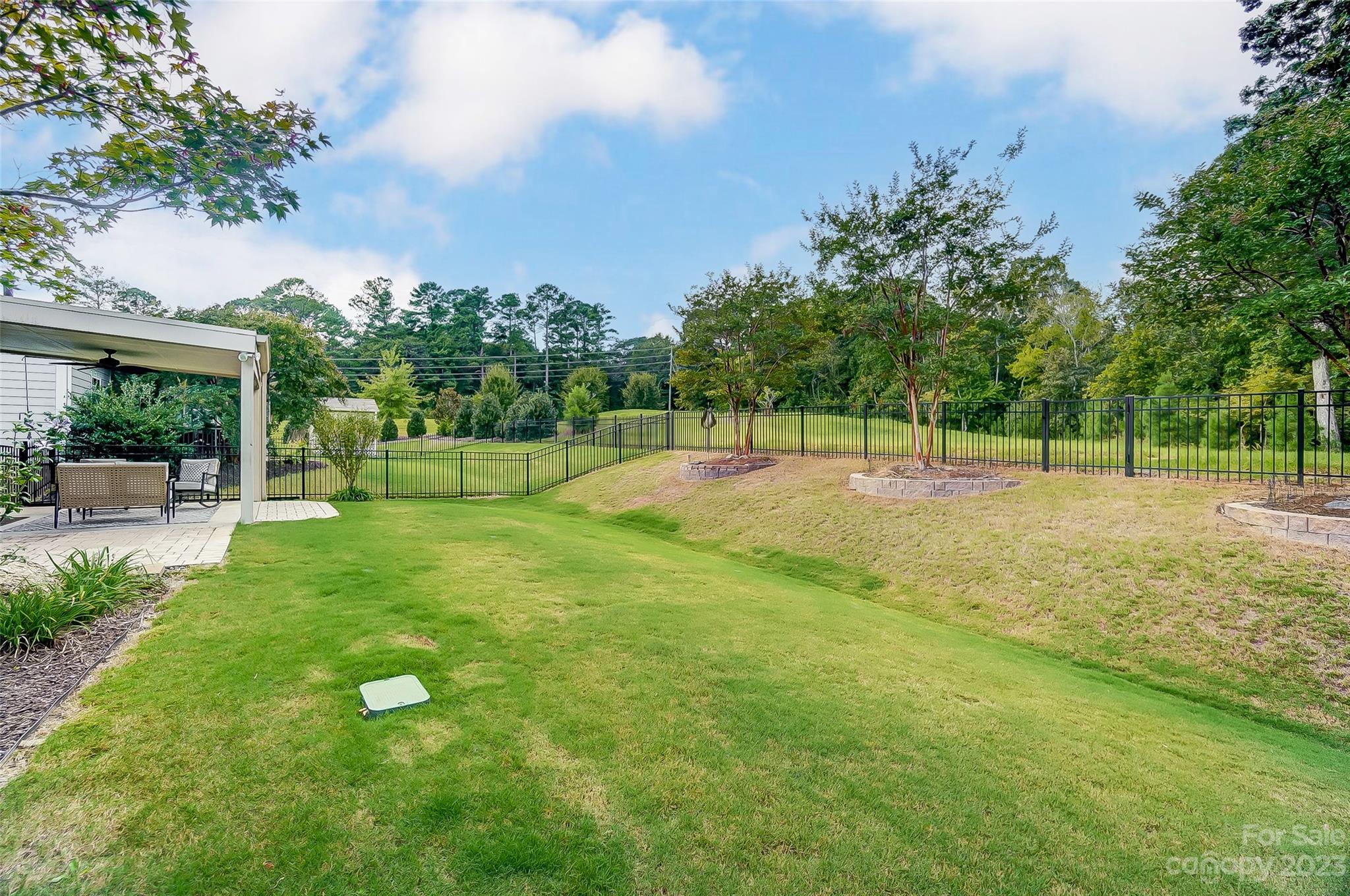 1719 Still River Way Fort Mill, SC 29708 - Photo 39 of 41 a view of outdoor space with a garden and trees