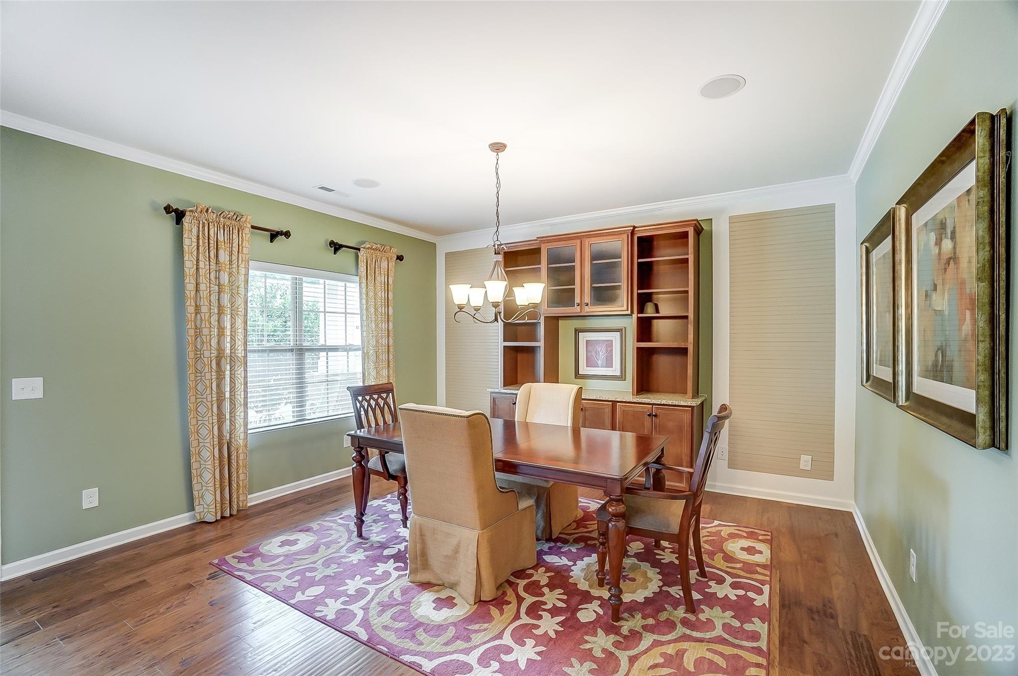 1719 Still River Way Fort Mill, SC 29708 - Photo 7 of 41 a dining room with wooden floor and large window