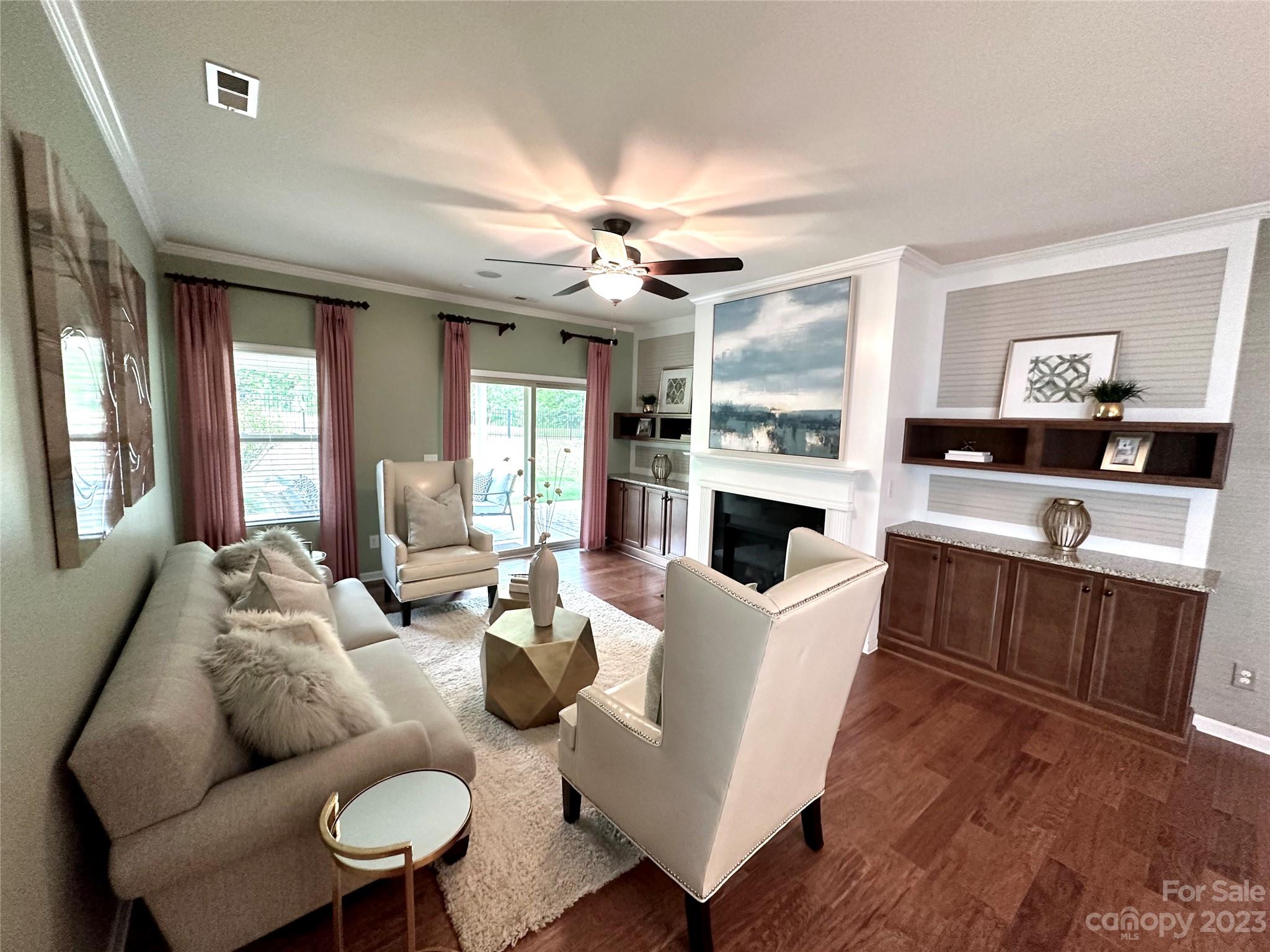 1719 Still River Way Fort Mill, SC 29708 - Photo 10 of 41 a living room with furniture a fireplace and a flat screen tv