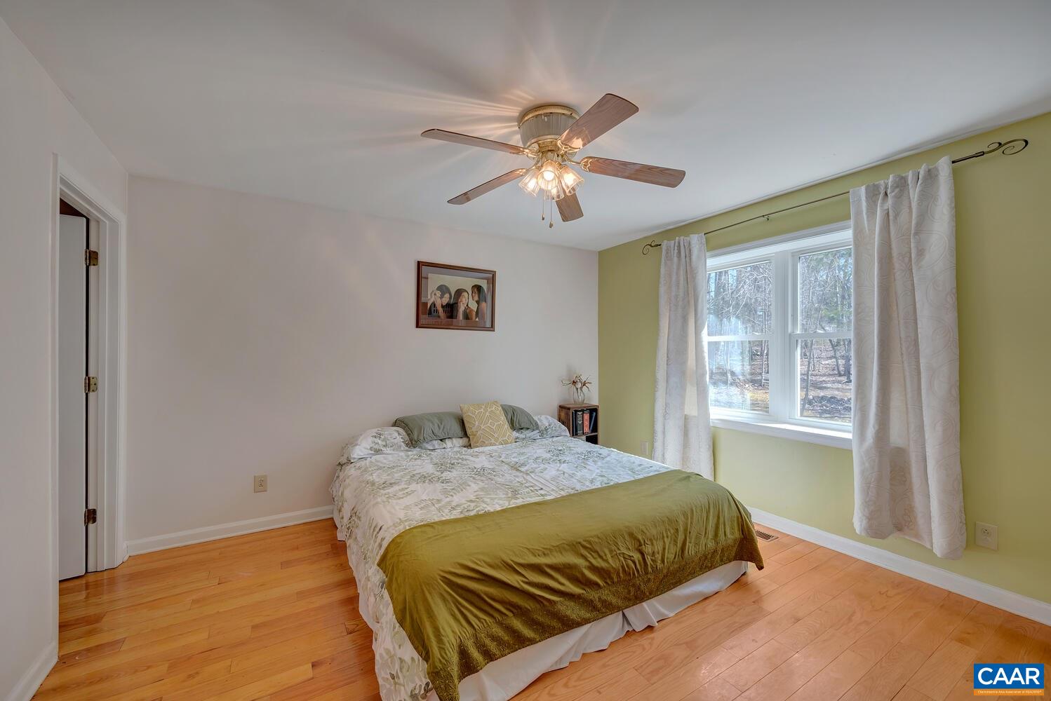 2850 Camp Spring Road Esmont, VA 22937 - Photo 12 of 35 a bedroom with a bed and a window