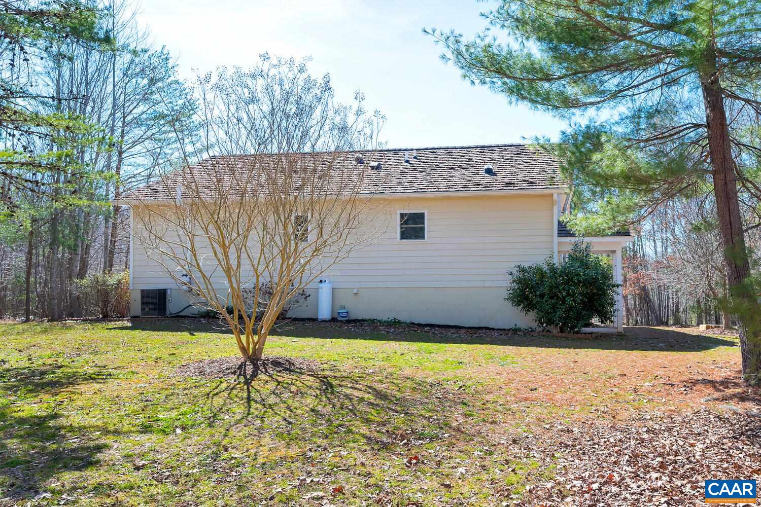 2850 Camp Spring Road Esmont, VA 22937 - Photo 26 of 35 a view of a backyard with a tree
