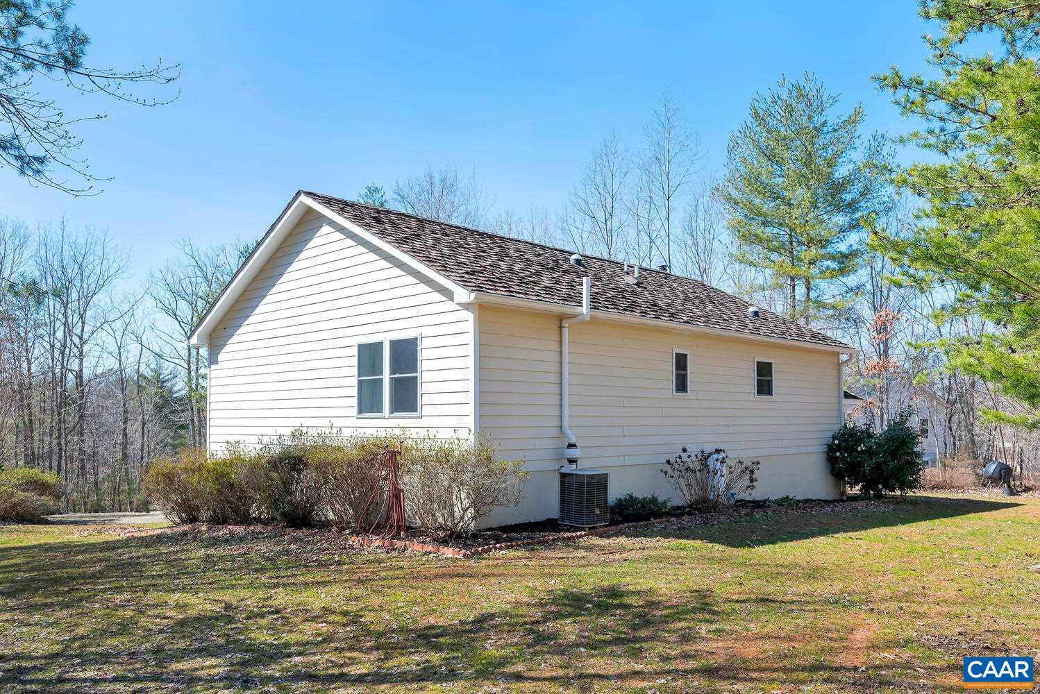 2850 Camp Spring Road Esmont, VA 22937 - Photo 27 of 35 a view of a house with a yard