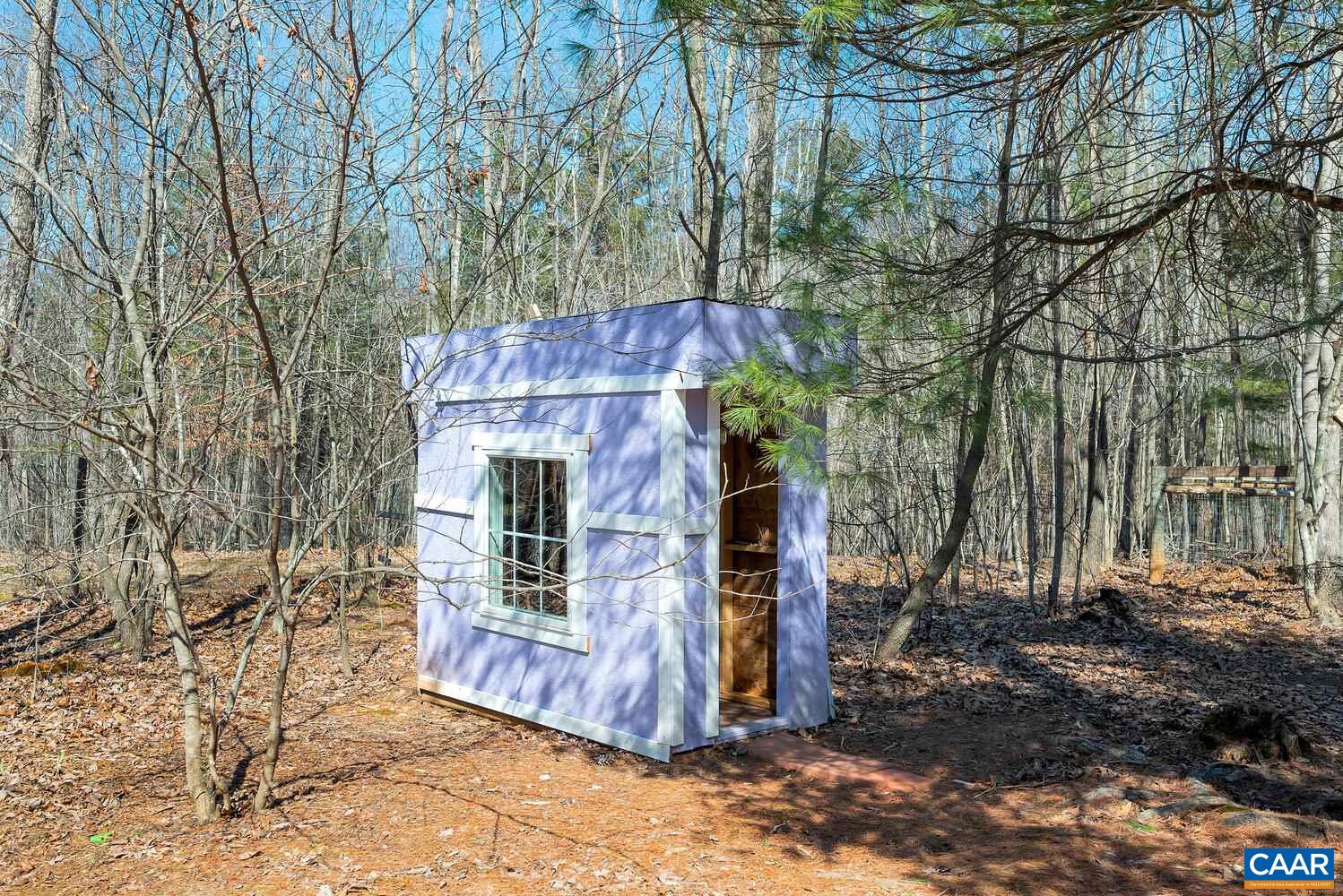 2850 Camp Spring Road Esmont, VA 22937 - Photo 29 of 35 a view of a wooden house with a large tree