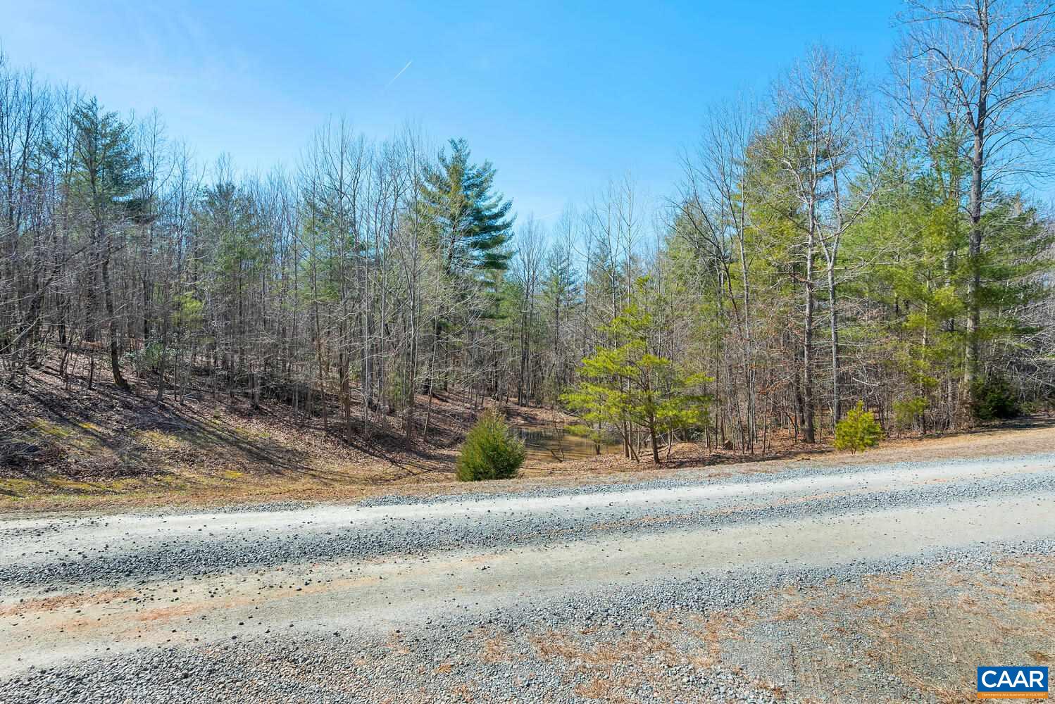 2850 Camp Spring Road Esmont, VA 22937 - Photo 34 of 35 a view of a road with a building in the background