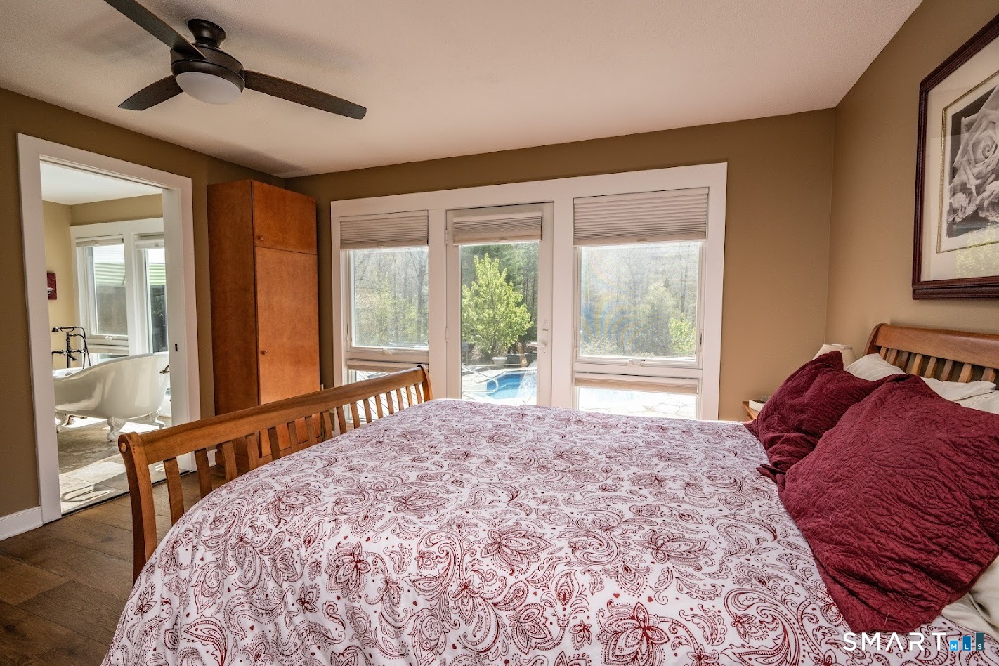 193 R Blue Hills Road Durham, CT 06422 - Photo 13 of 30 a bed sitting in a bedroom next to a window