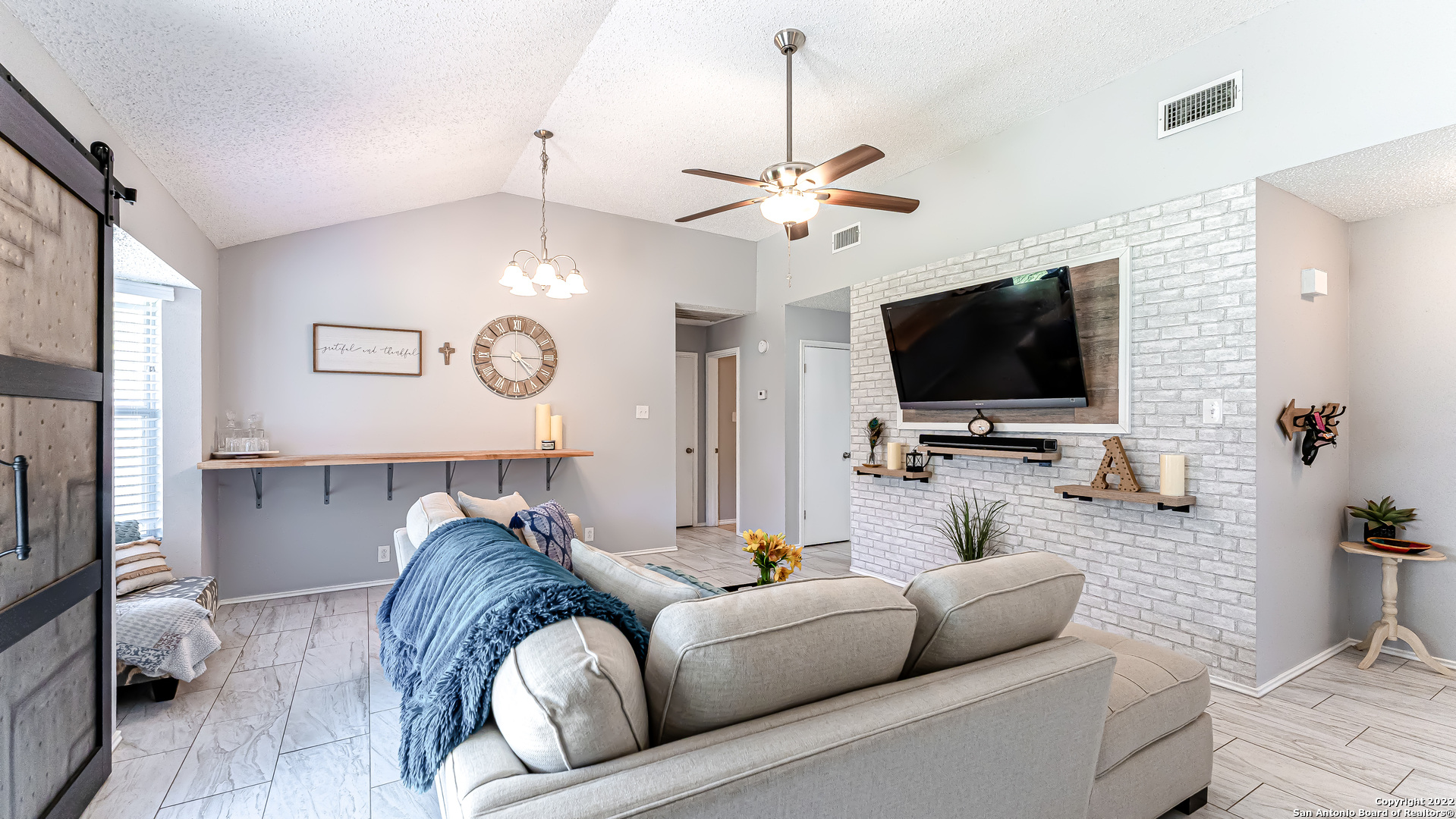 3309 Country View Schertz, TX 78108 - Photo 14 of 27 a living room with furniture and a flat screen tv