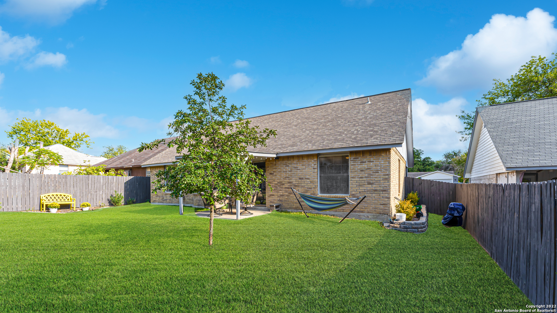 3309 Country View Schertz, TX 78108 - Photo 26 of 27 a view of a house with a yard porch and a garden