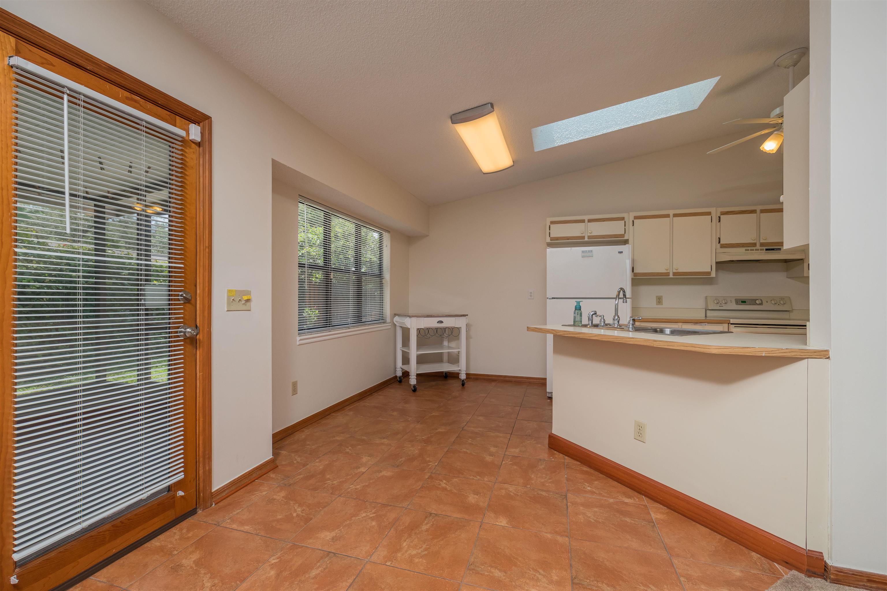 836 Queen Road St. Augustine, FL 32086 - Photo 10 of 26 a view of kitchen with granite countertop cabinets and sink