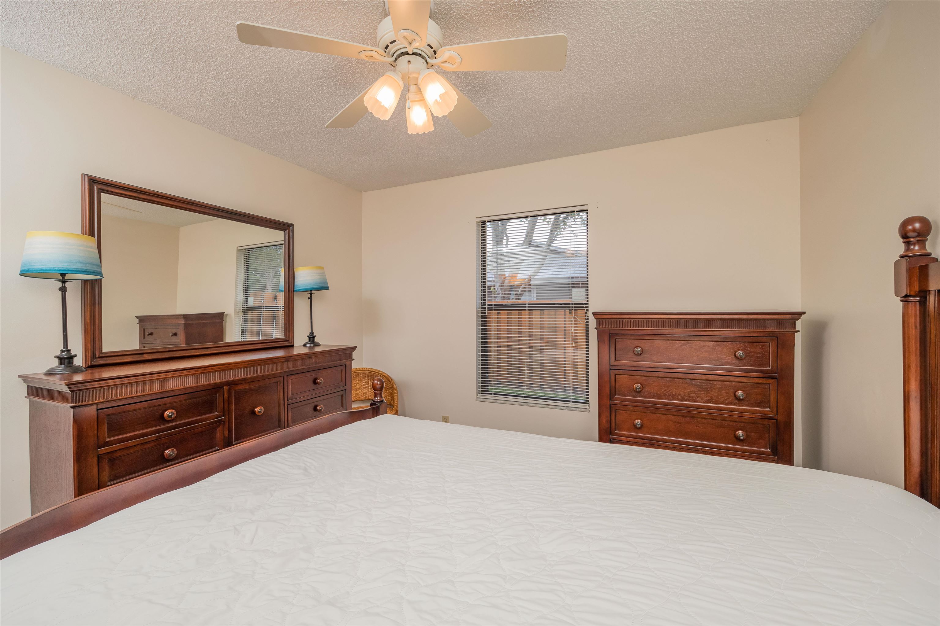 836 Queen Road St. Augustine, FL 32086 - Photo 21 of 26 a bedroom with a bed and a dresser