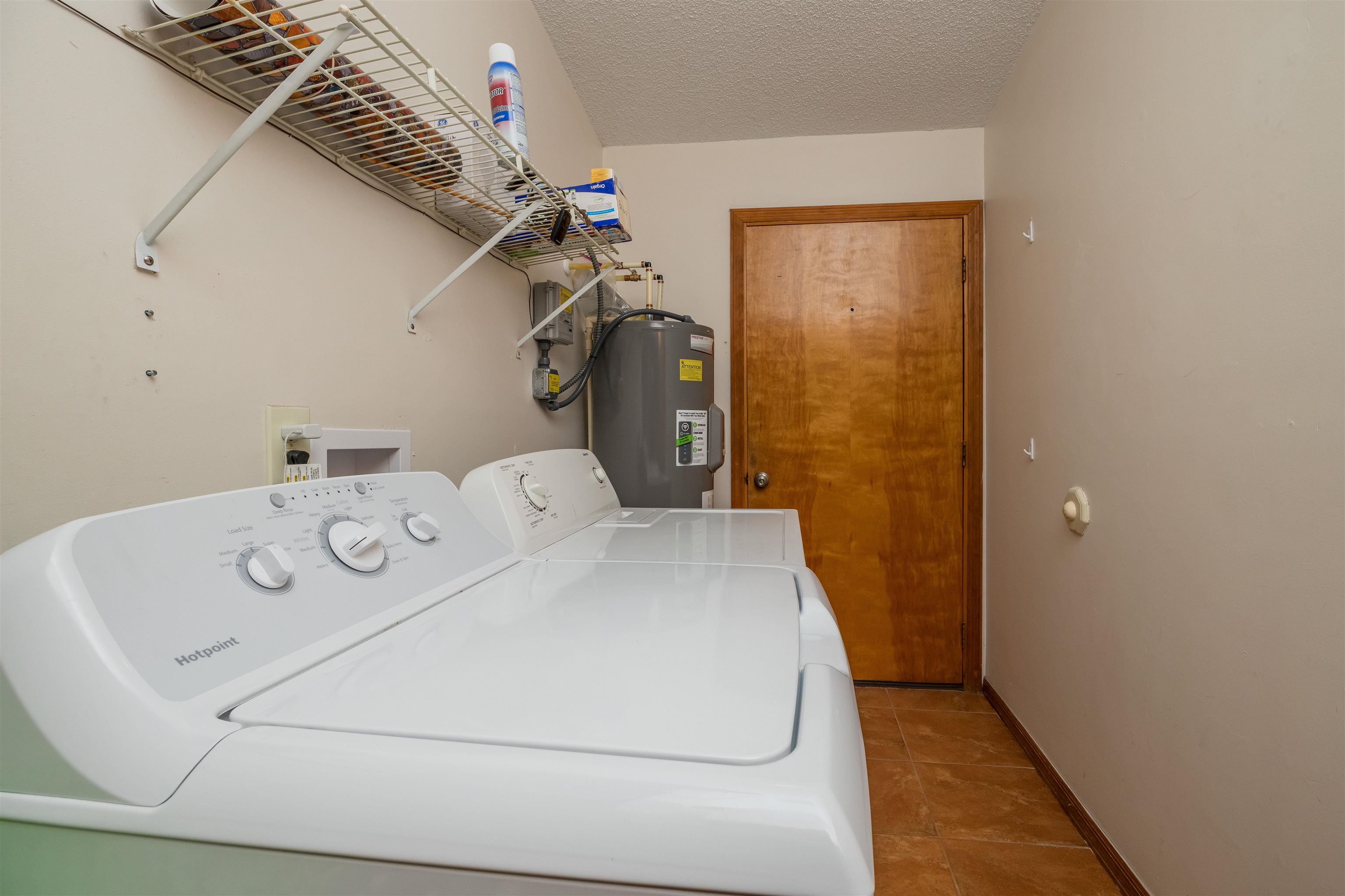 836 Queen Road St. Augustine, FL 32086 - Photo 24 of 26 a utility room with dryer and washer