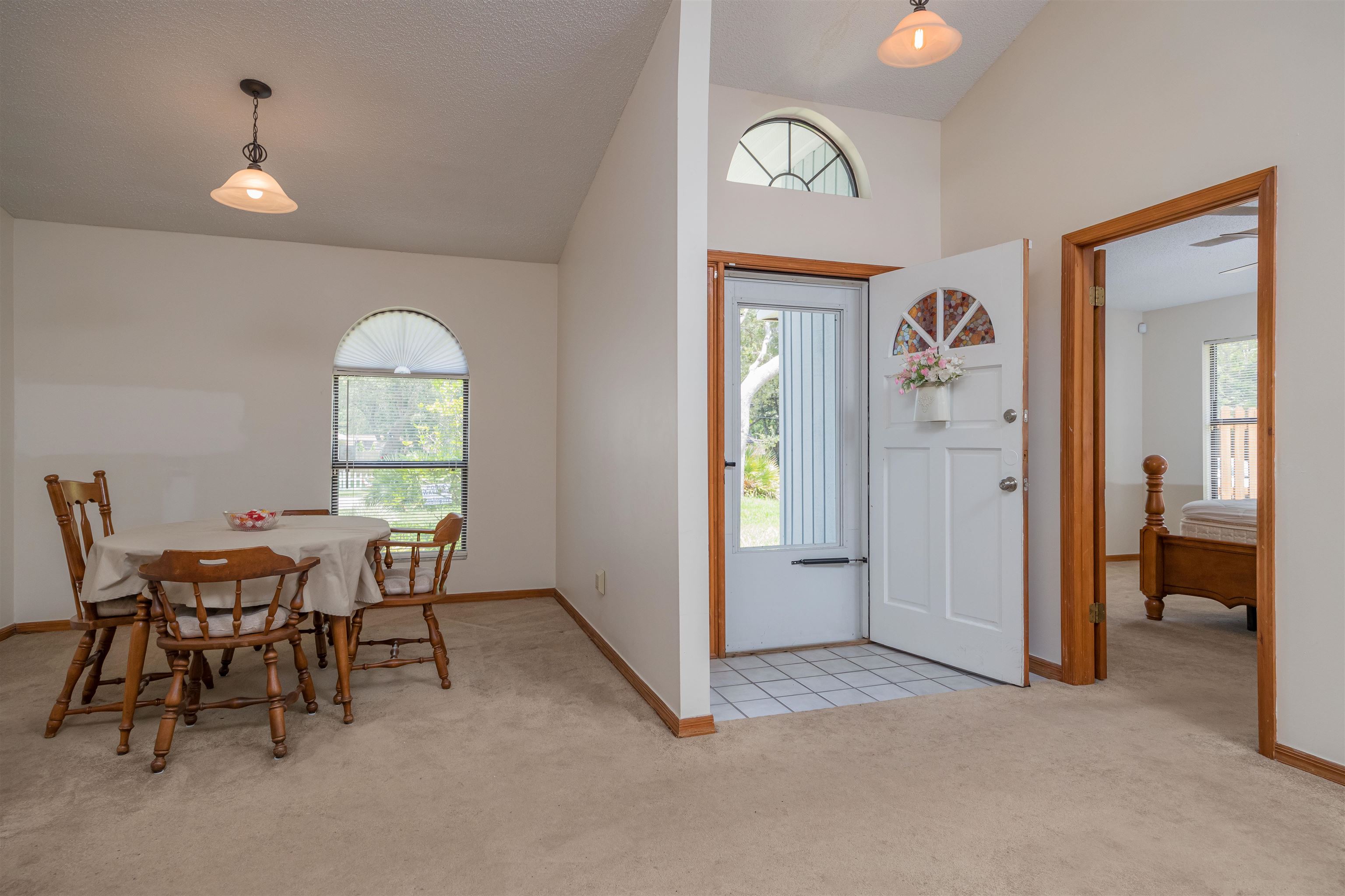 836 Queen Road St. Augustine, FL 32086 - Photo 6 of 26 a view of a livingroom with furniture and a window