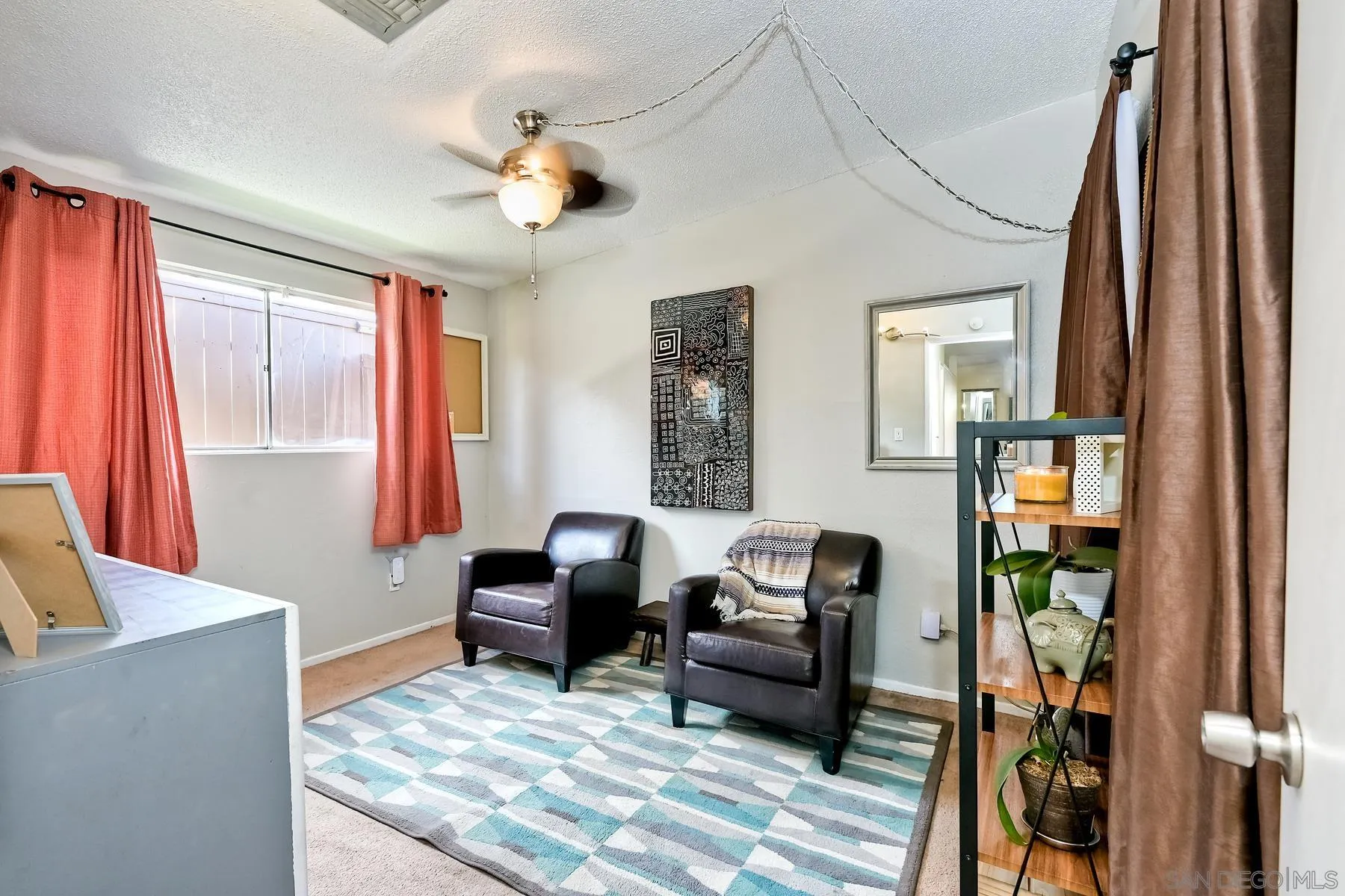 9267 Fairlawn Street Santee, CA 92071 - Photo 17 of 25 a living room with furniture and a window