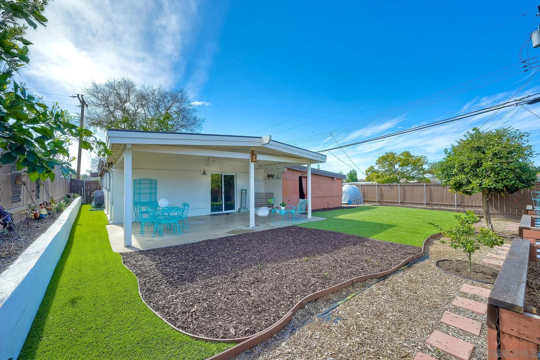 9267 Fairlawn Street Santee, CA 92071 - Photo 20 of 25 a view of a house with backyard and porch