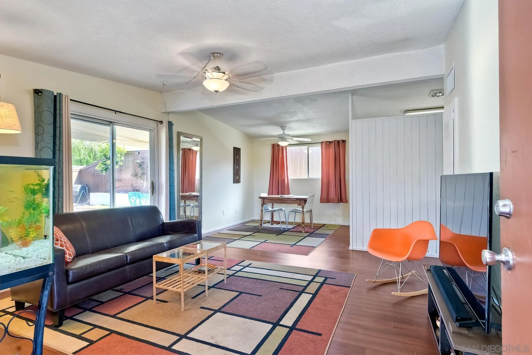 9267 Fairlawn Street Santee, CA 92071 - Photo 5 of 25 a living room with furniture and a large window