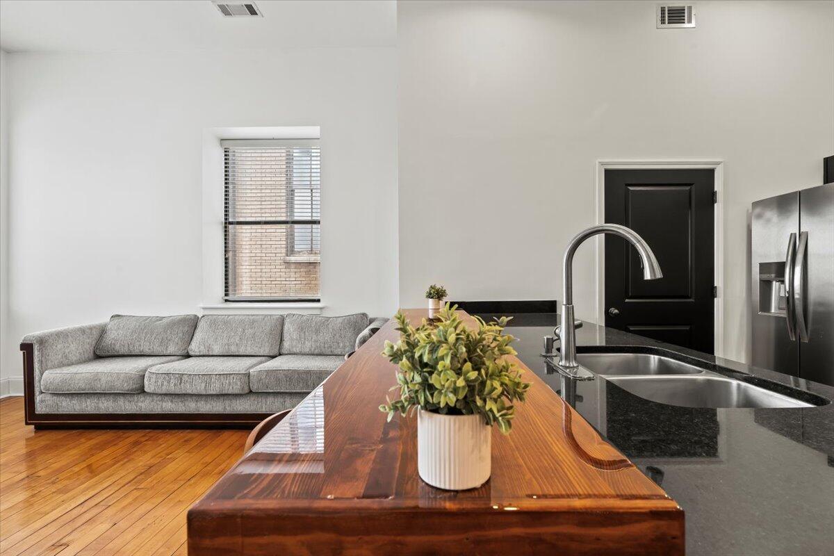 936 Broad Street, Unit 214 Augusta, GA 30901 - Photo 16 of 35 27-Kitchen Island