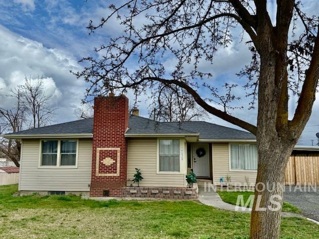 1139 Webster Street Clarkston, WA 99403 - Photo 2 of 34 View of front of house with a chimney and a shingled roof