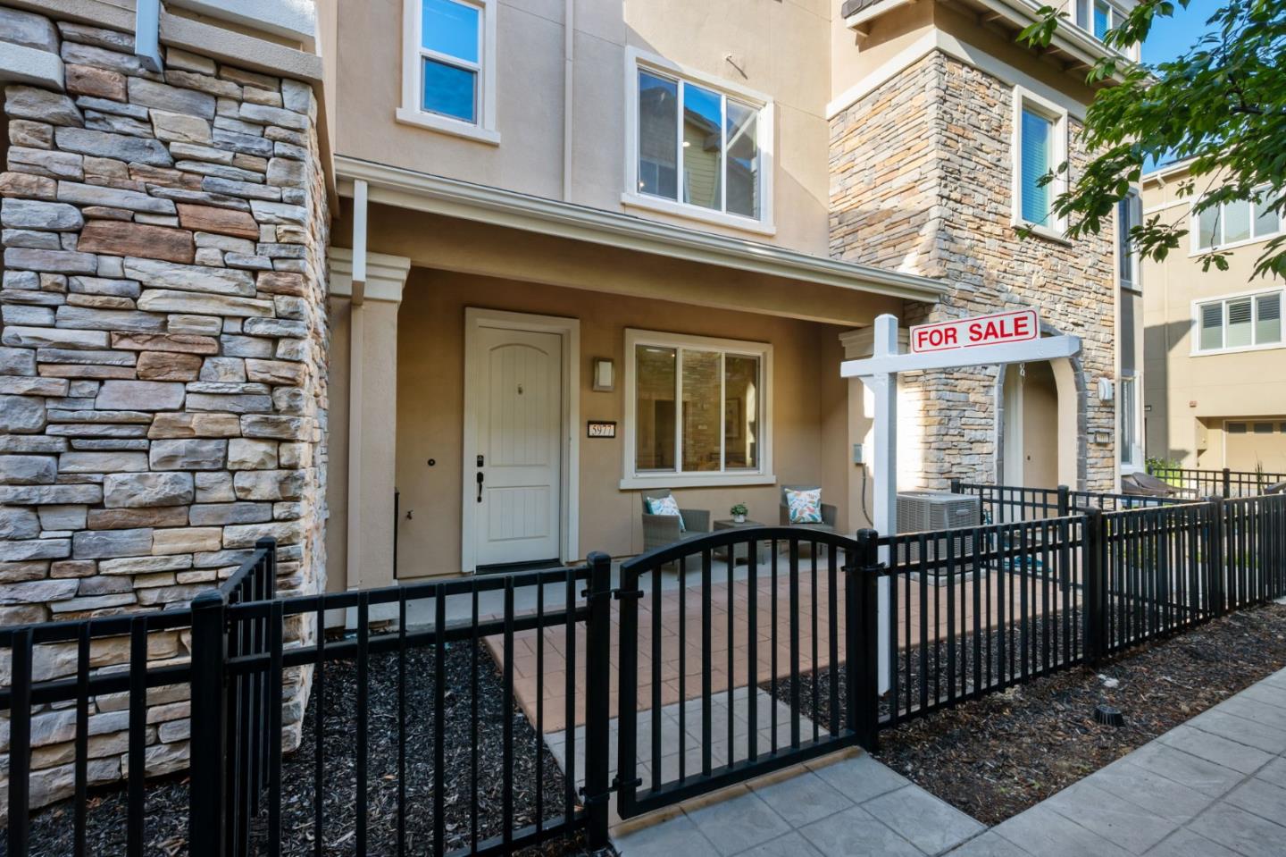 5977 Larkstone Loop San Jose, CA 95123 - Photo 2 of 63 a front view of a house