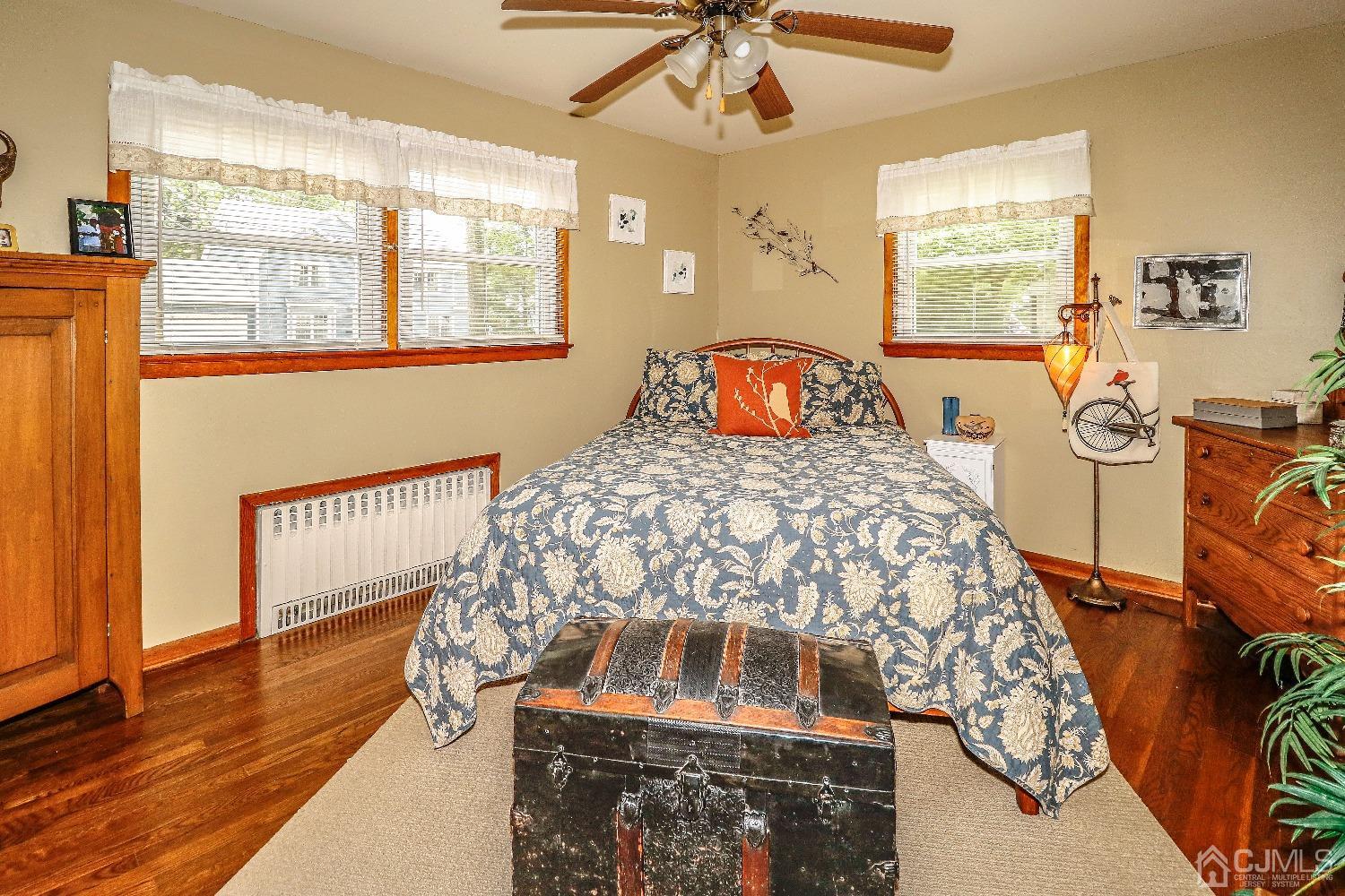 40 Highland Road Colonia, NJ 07067 - Photo 18 of 37 a bedroom with a bed and a window