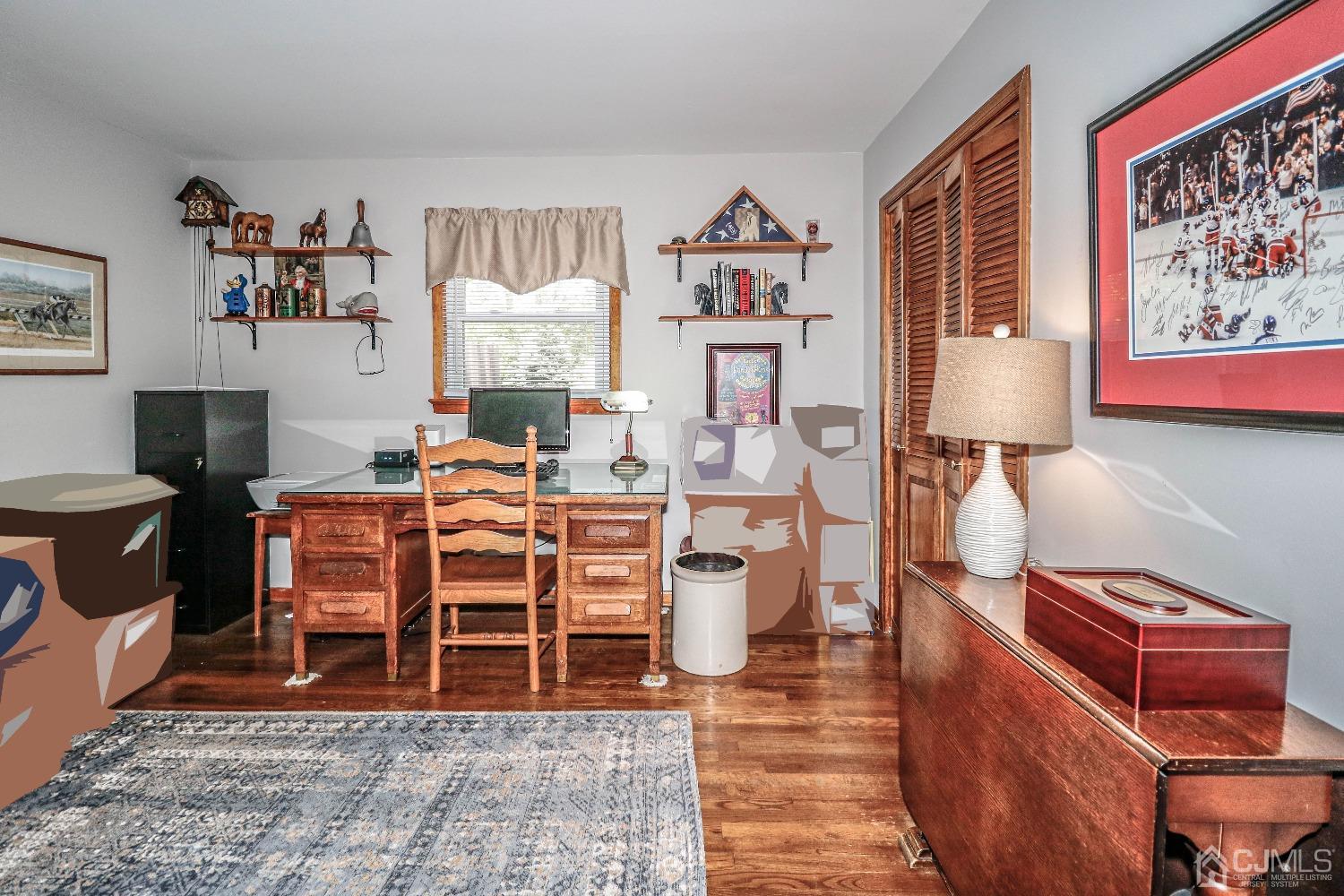 40 Highland Road Colonia, NJ 07067 - Photo 20 of 37 a room with furniture a rug and a window