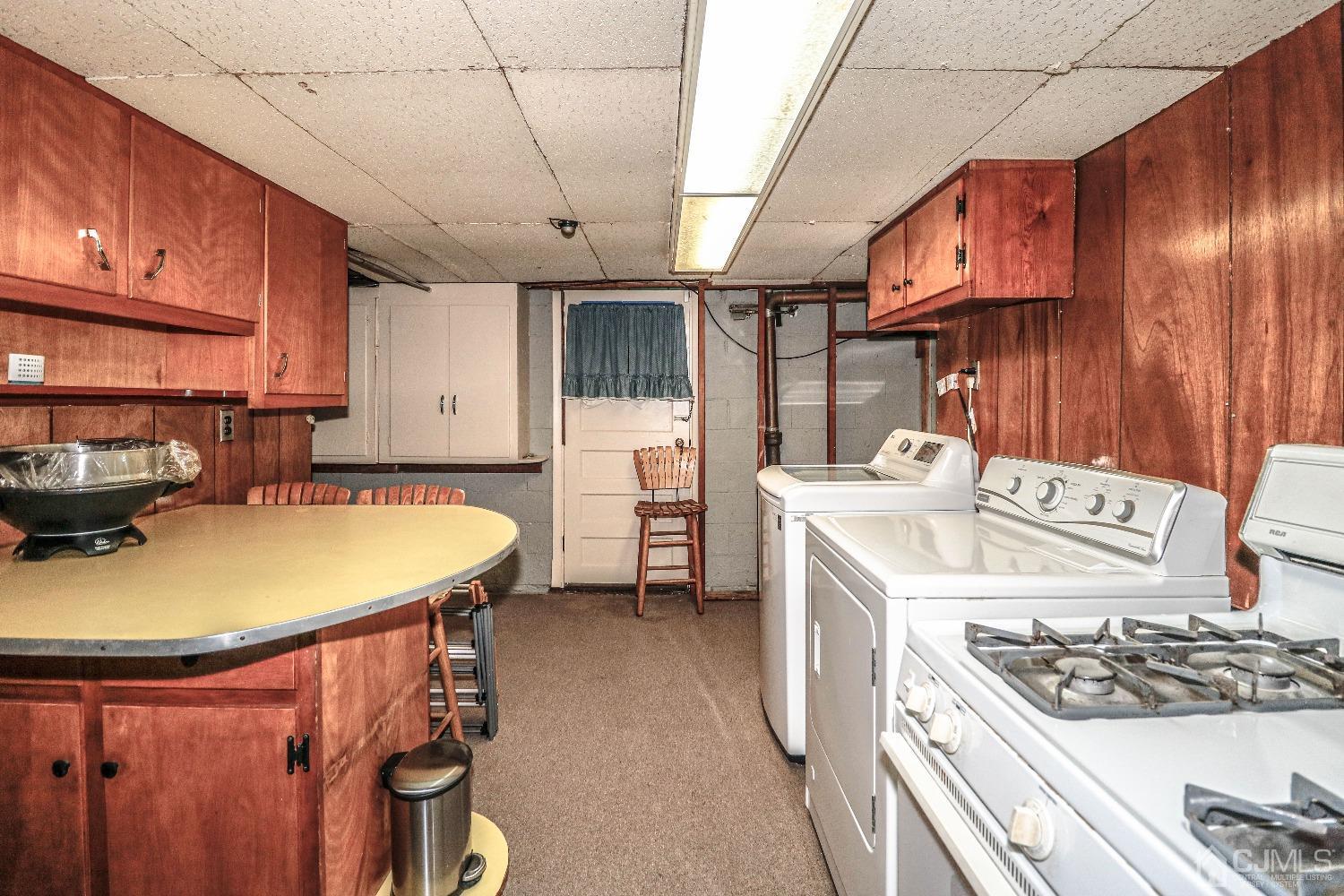 40 Highland Road Colonia, NJ 07067 - Photo 30 of 37 a kitchen with a stove and a sink