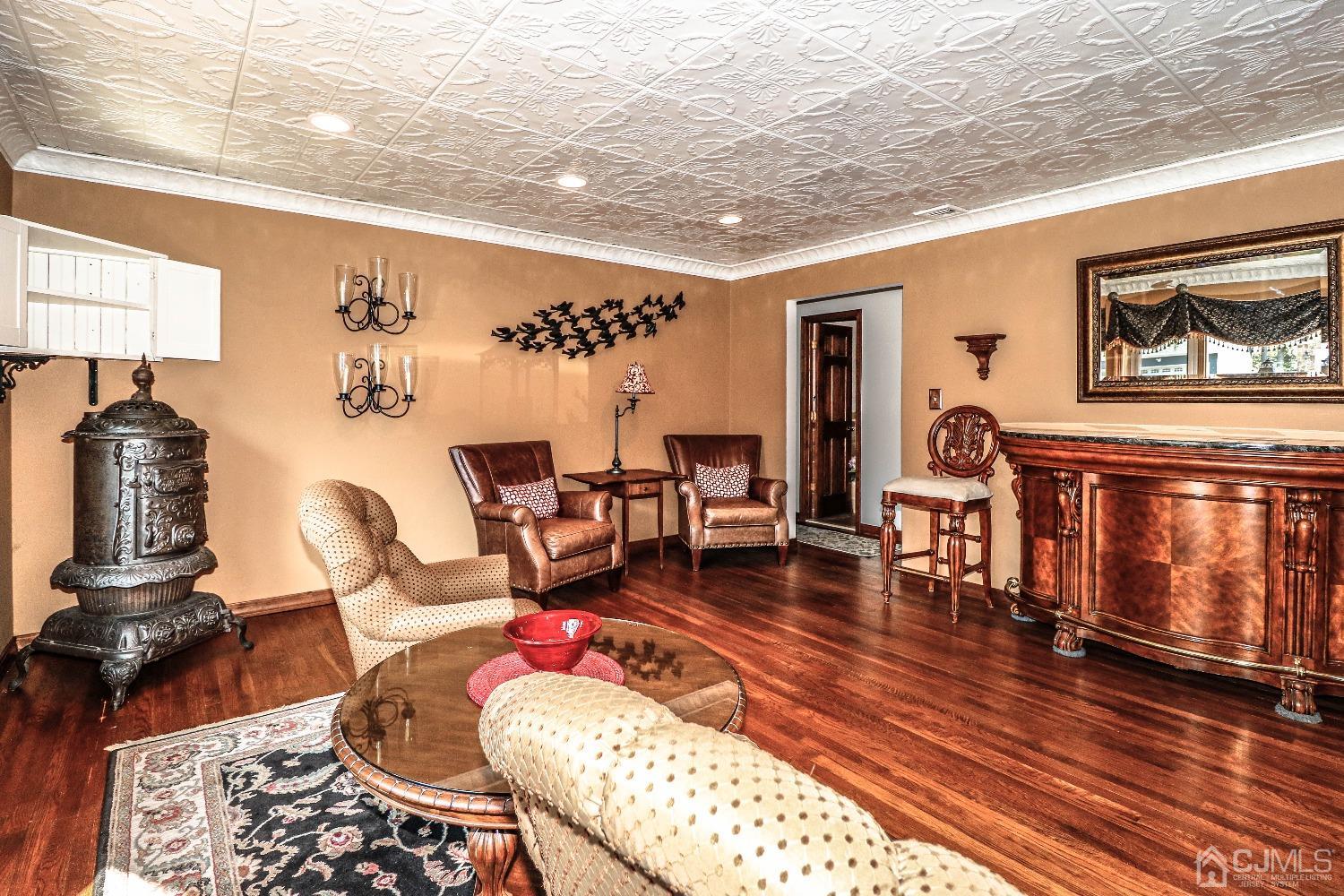 40 Highland Road Colonia, NJ 07067 - Photo 8 of 37 a living room with furniture and wooden floor