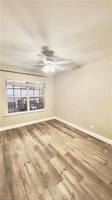 19550 Bowring Park Road, Unit 103 Fort Myers, FL 33967 - Photo 11 of 22 a view of an empty room with a window