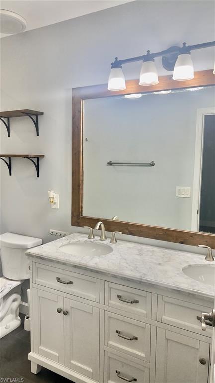 19550 Bowring Park Road, Unit 103 Fort Myers, FL 33967 - Photo 16 of 22 a bathroom with a sink and a mirror