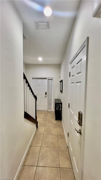 19550 Bowring Park Road, Unit 103 Fort Myers, FL 33967 - Photo 3 of 22 a view of a hallway with closet