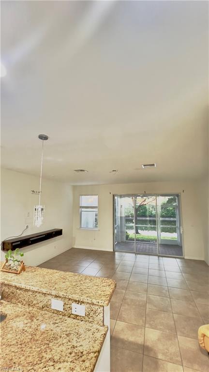 19550 Bowring Park Road, Unit 103 Fort Myers, FL 33967 - Photo 6 of 22 a view of an empty room and window