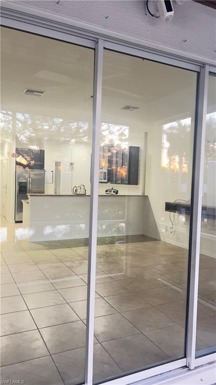 19550 Bowring Park Road, Unit 103 Fort Myers, FL 33967 - Photo 9 of 22 a view of a hallway