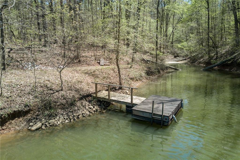 1279 Coneross Point Drive Seneca, SC 29678 - Photo 2 of 48 Photo was taken when the lake was at full pool and doesn't reflect the lake being below full pool.