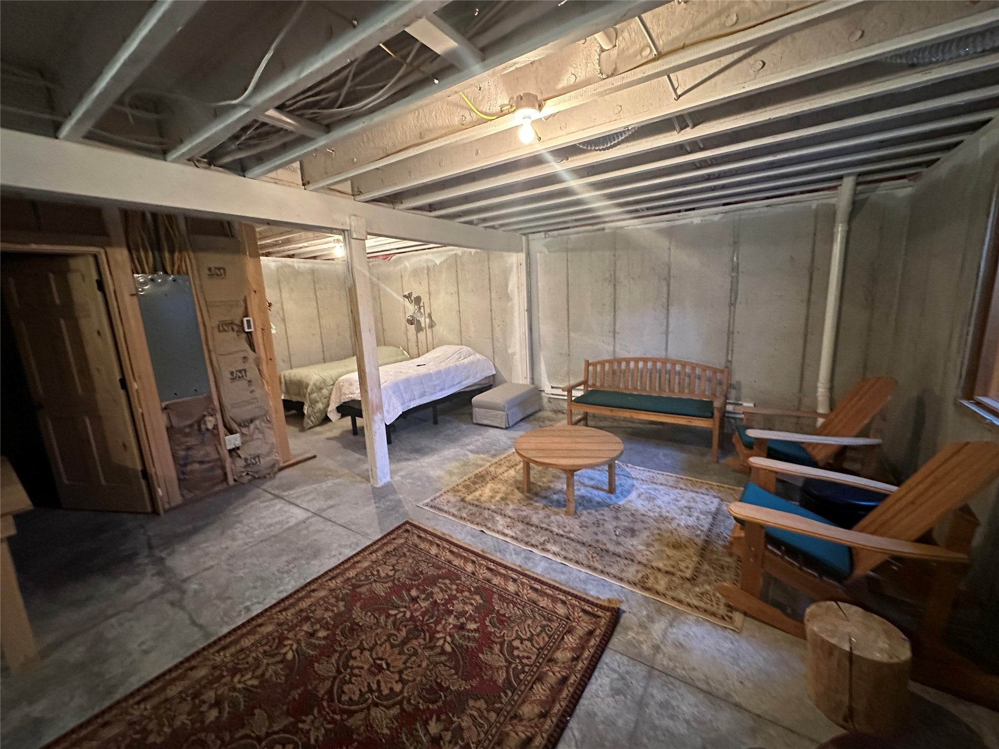 3916 Main Boulder Road McLeod, MT 59052 - Photo 35 of 38 Bedroom with unfinished concrete flooring