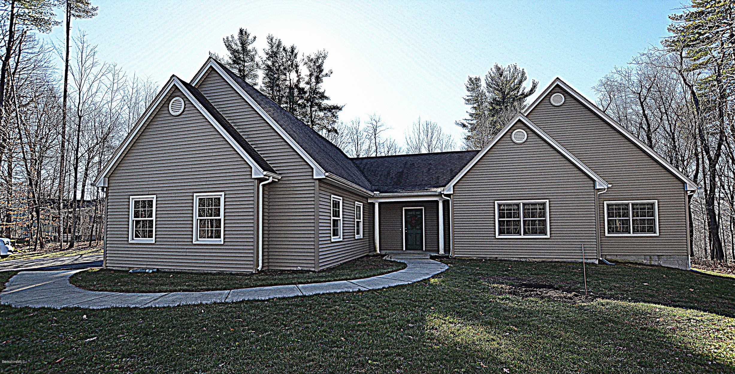 2307 Jacobs Ladder Road Becket, MA 01223 - Photo 1 of 55 a view of a house with a yard