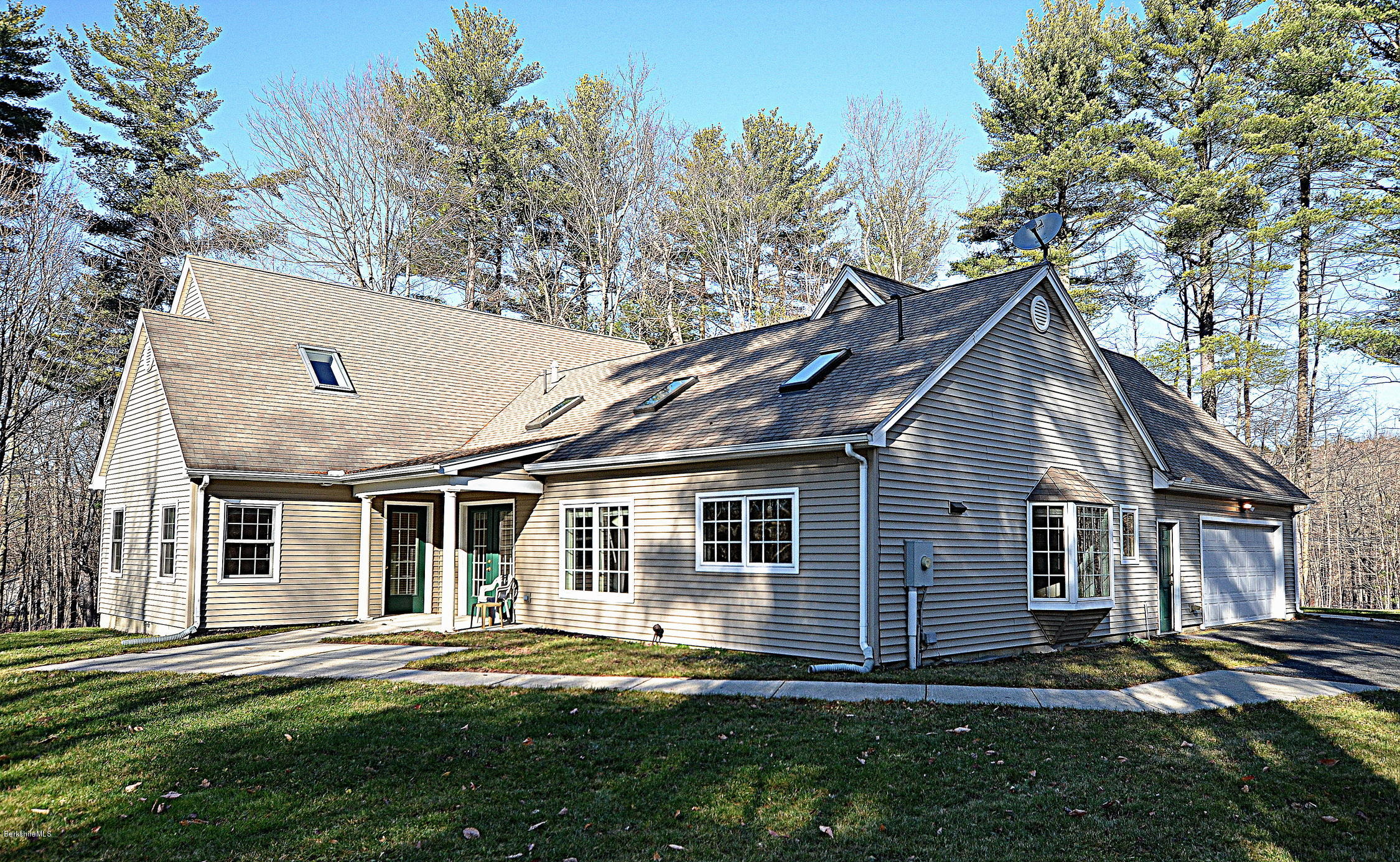 2307 Jacobs Ladder Road Becket, MA 01223 - Photo 2 of 55 front view of a house with a yard