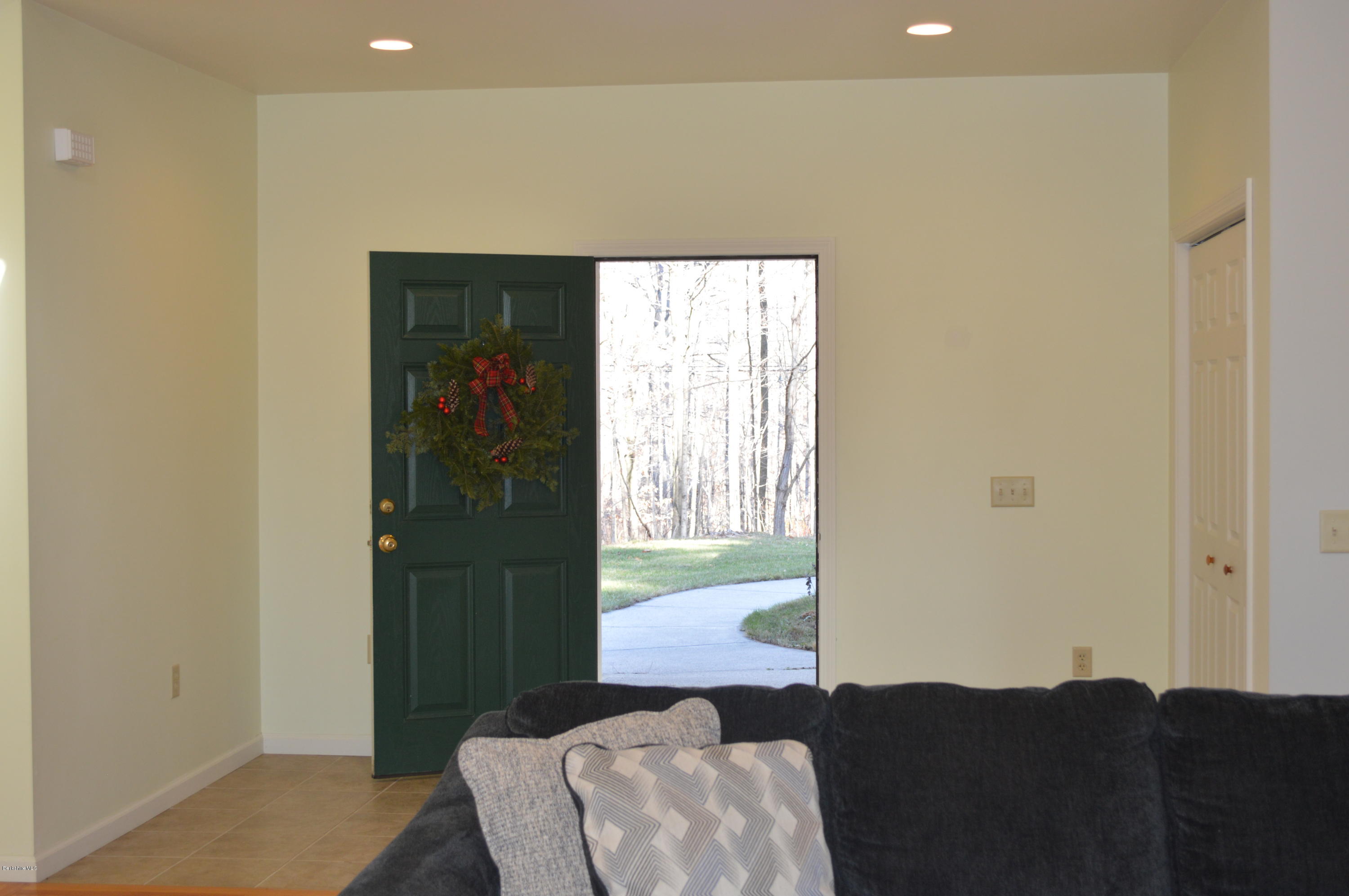 2307 Jacobs Ladder Road Becket, MA 01223 - Photo 14 of 55 a living room with furniture and a window