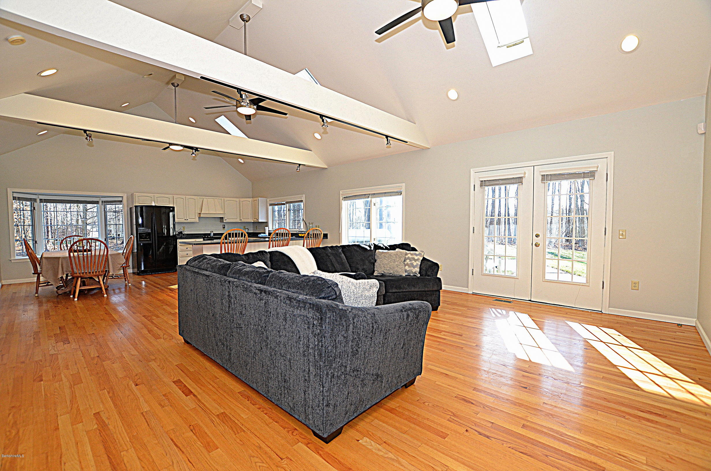 2307 Jacobs Ladder Road Becket, MA 01223 - Photo 18 of 55 a living room with furniture and a wooden floor