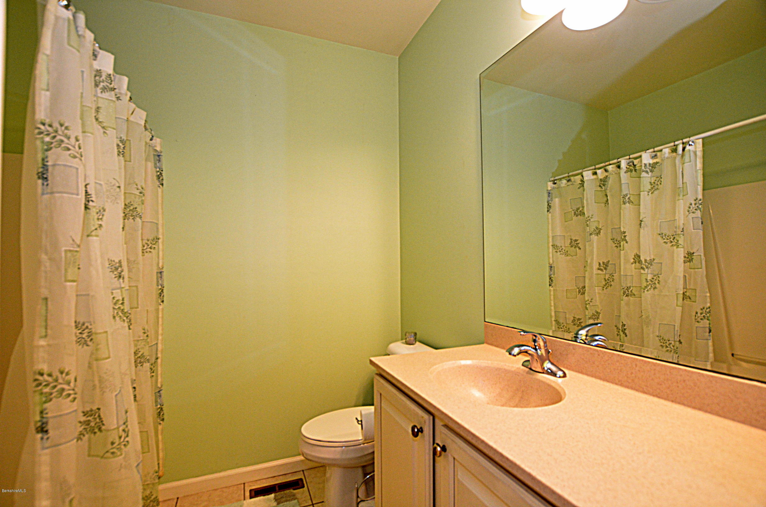 2307 Jacobs Ladder Road Becket, MA 01223 - Photo 25 of 55 a bathroom with a sink toilet and shower