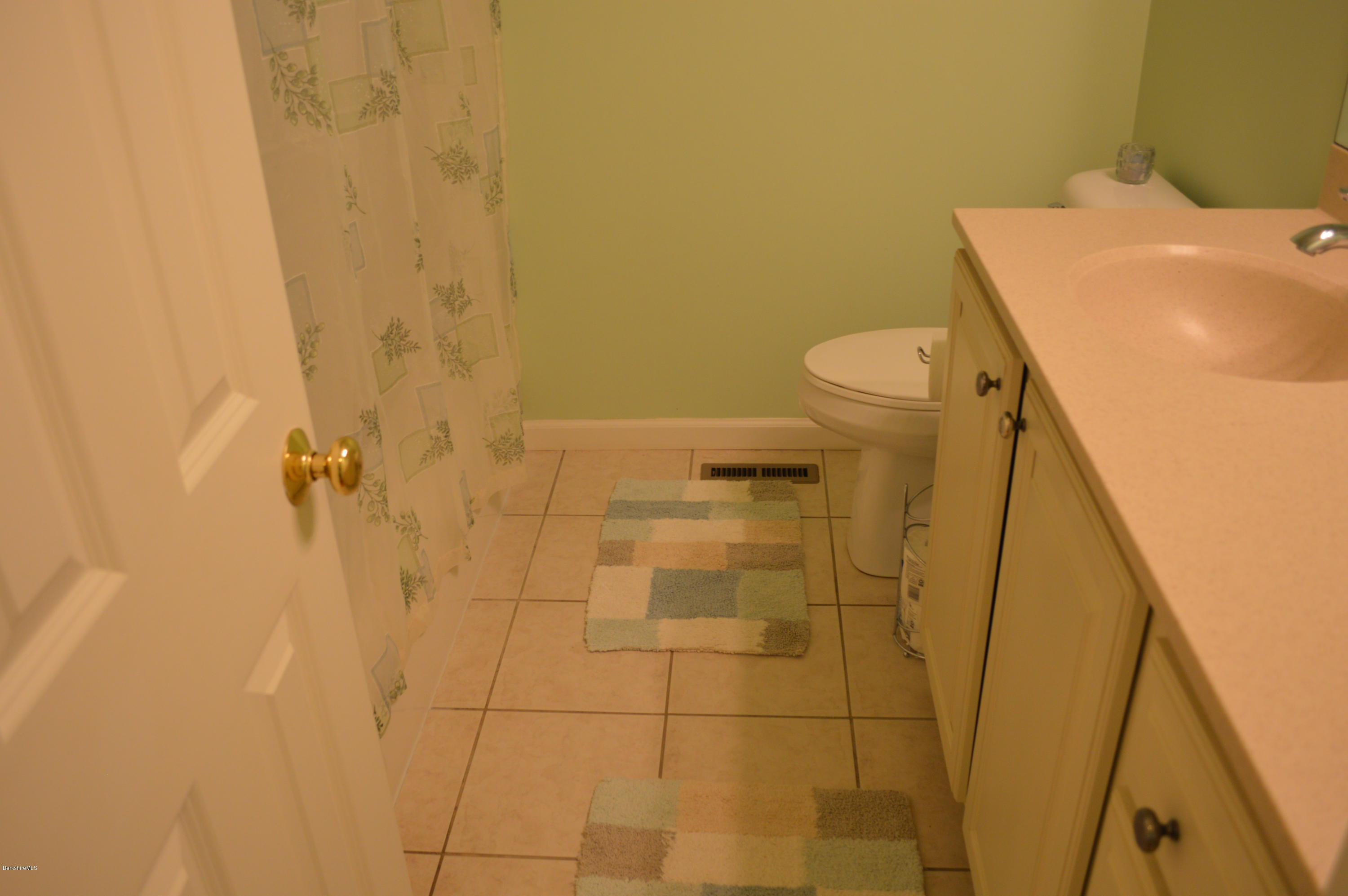 2307 Jacobs Ladder Road Becket, MA 01223 - Photo 26 of 55 a bathroom with a sink and a toilet