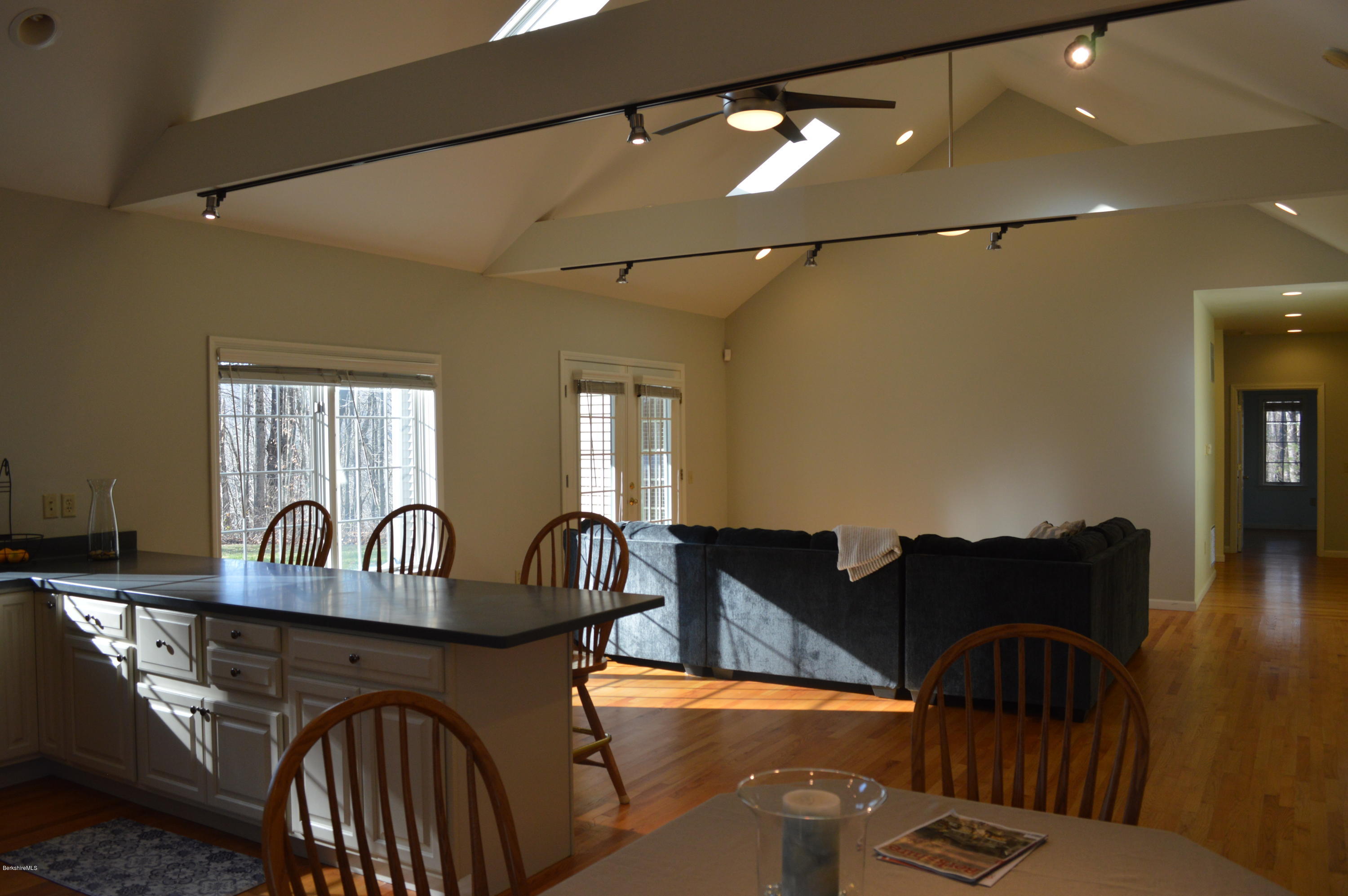 2307 Jacobs Ladder Road Becket, MA 01223 - Photo 42 of 55 a table and chairs in a balcony