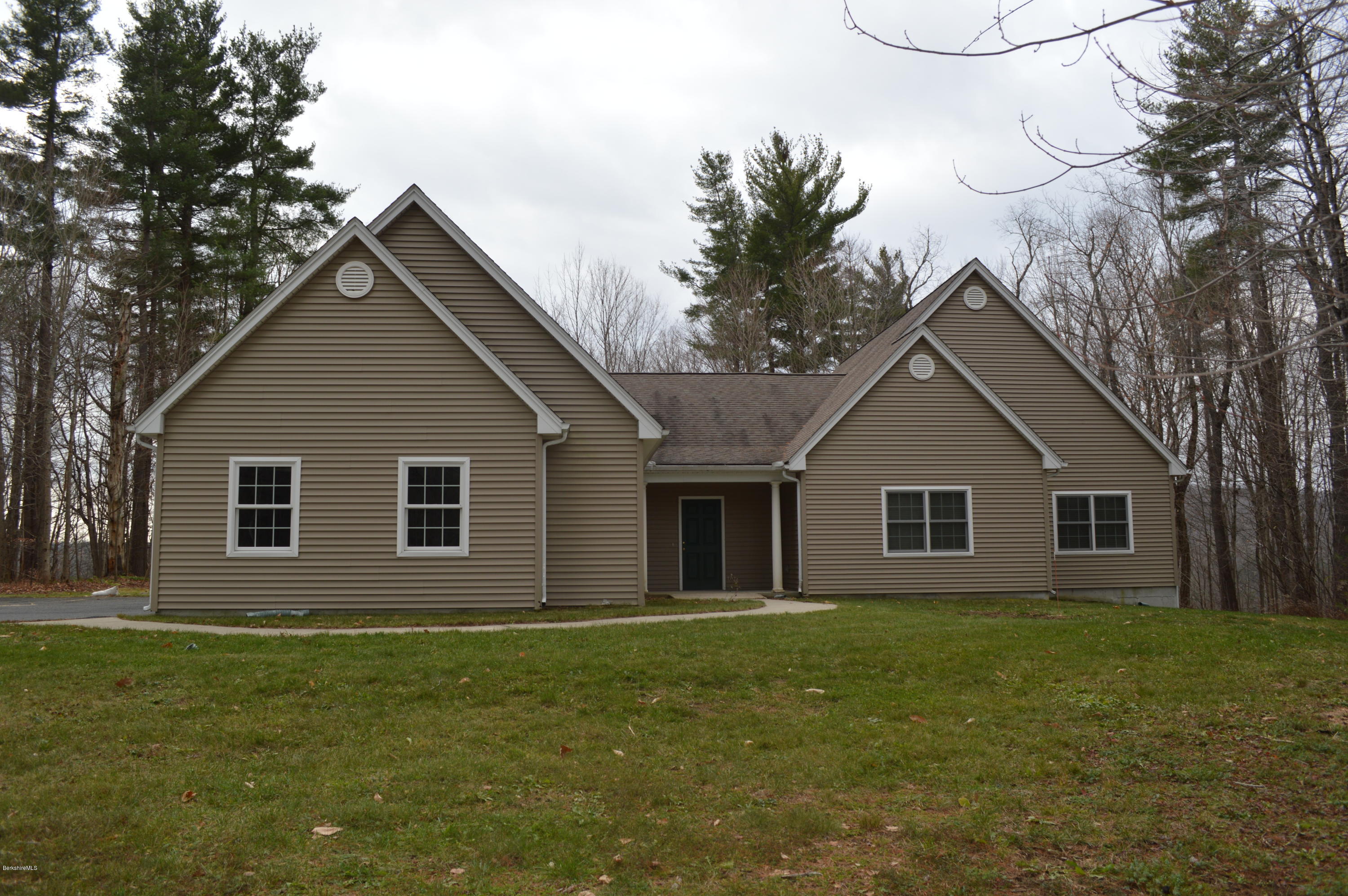 2307 Jacobs Ladder Road Becket, MA 01223 - Photo 47 of 55 a view of a house with a yard