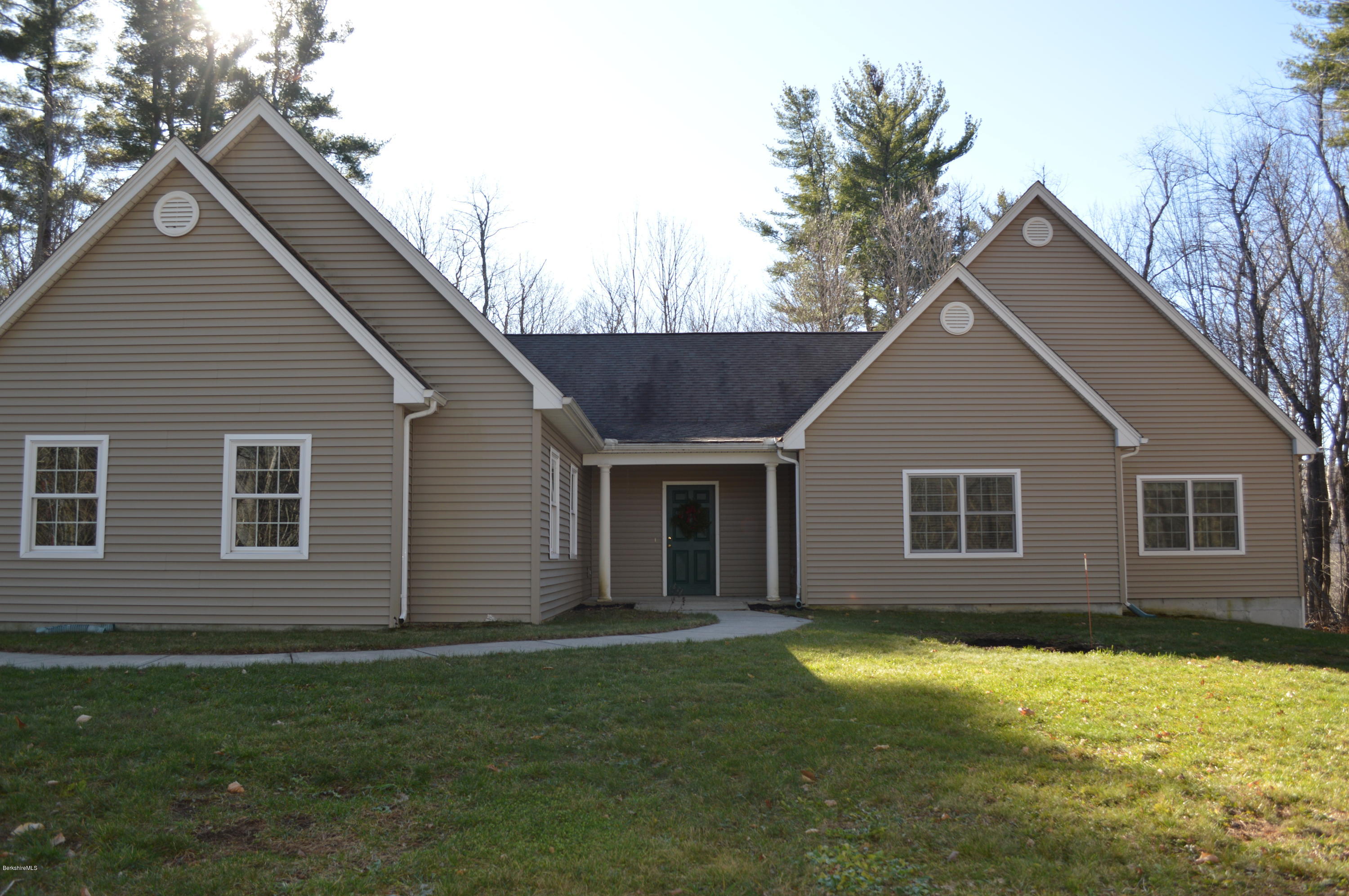 2307 Jacobs Ladder Road Becket, MA 01223 - Photo 48 of 55 a view of a house with a yard