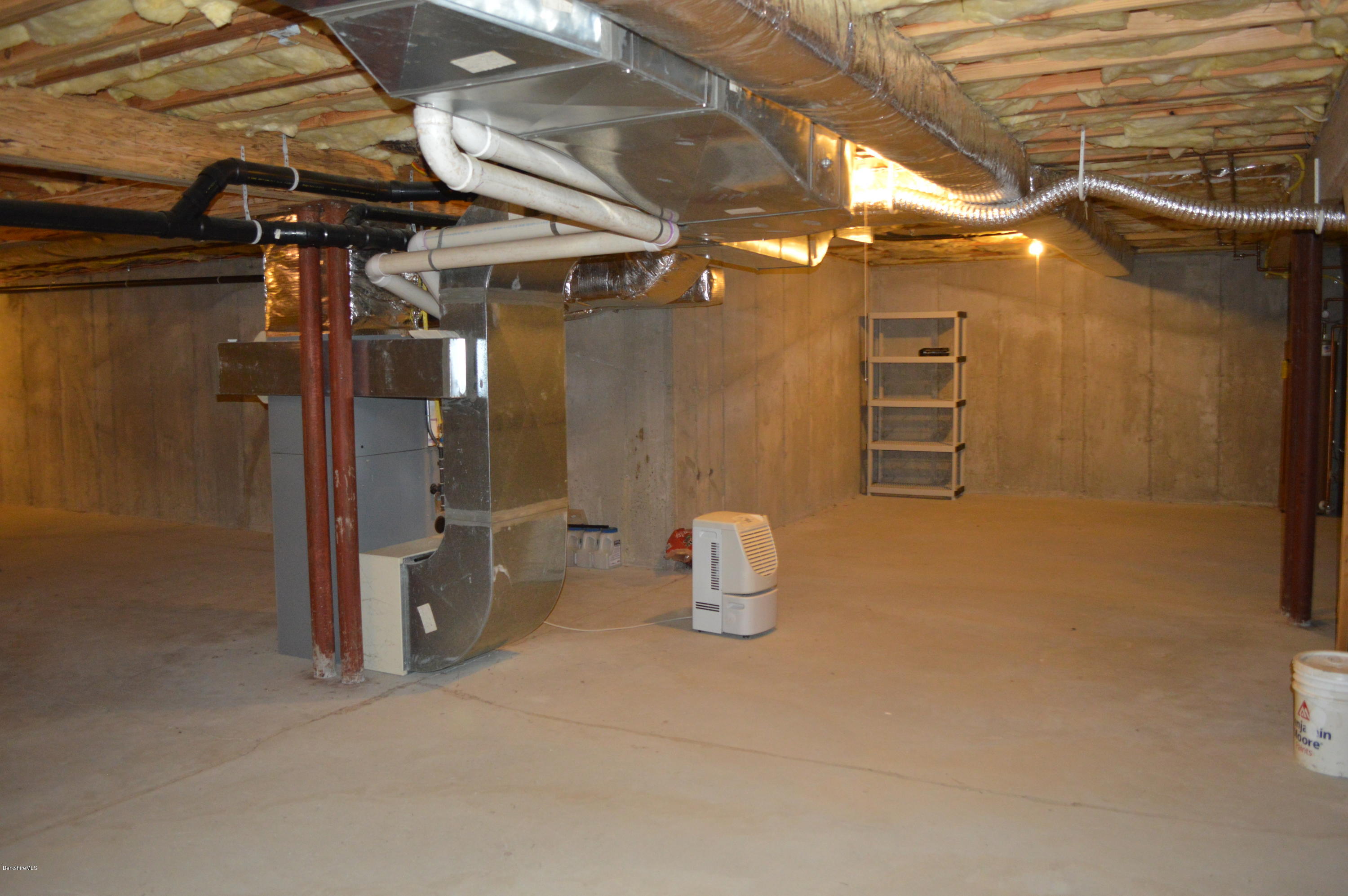 2307 Jacobs Ladder Road Becket, MA 01223 - Photo 55 of 55 a view of an empty room with a wooden chair