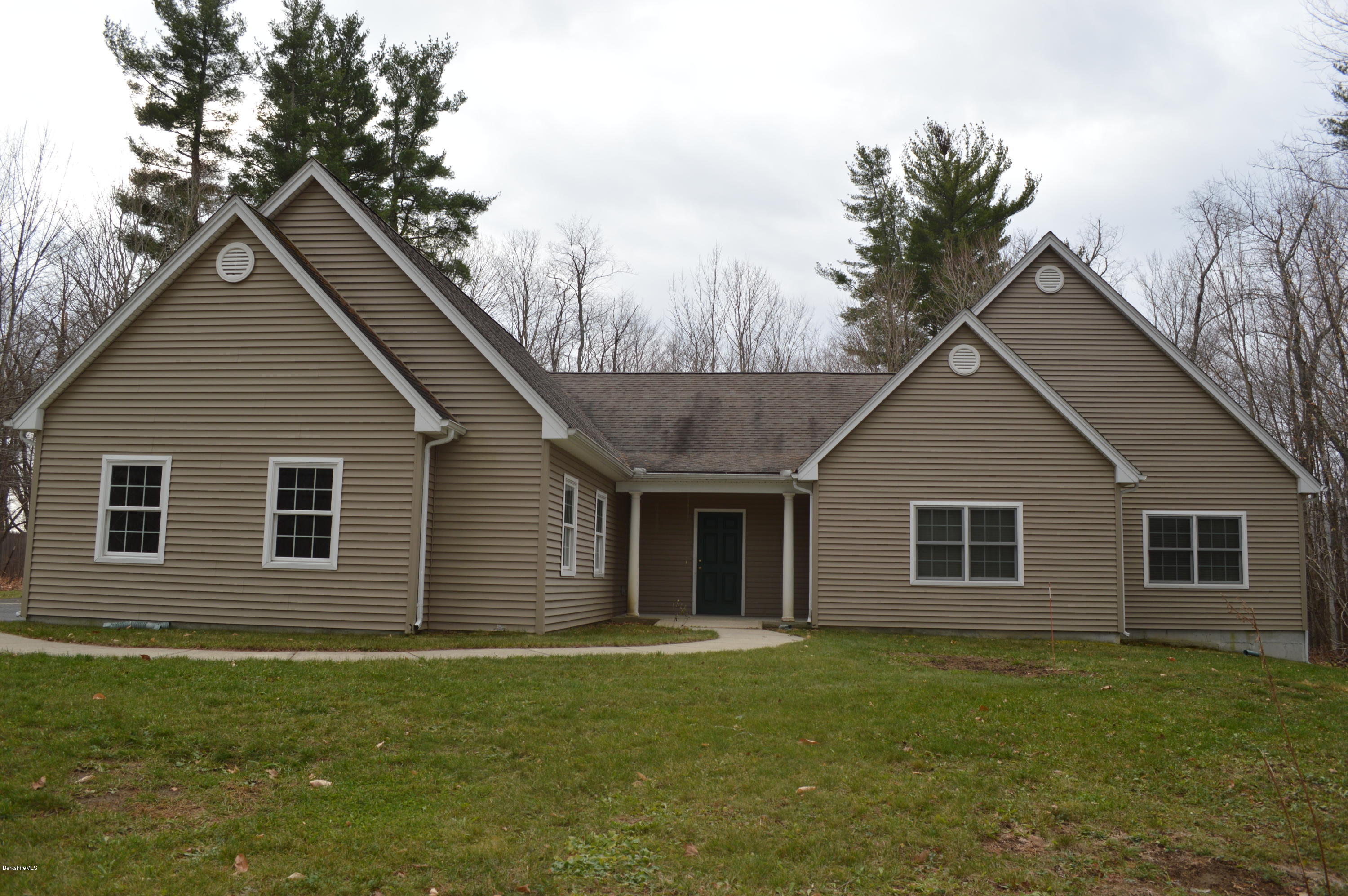 2307 Jacobs Ladder Road Becket, MA 01223 - Photo 8 of 55 a view of a house with a yard
