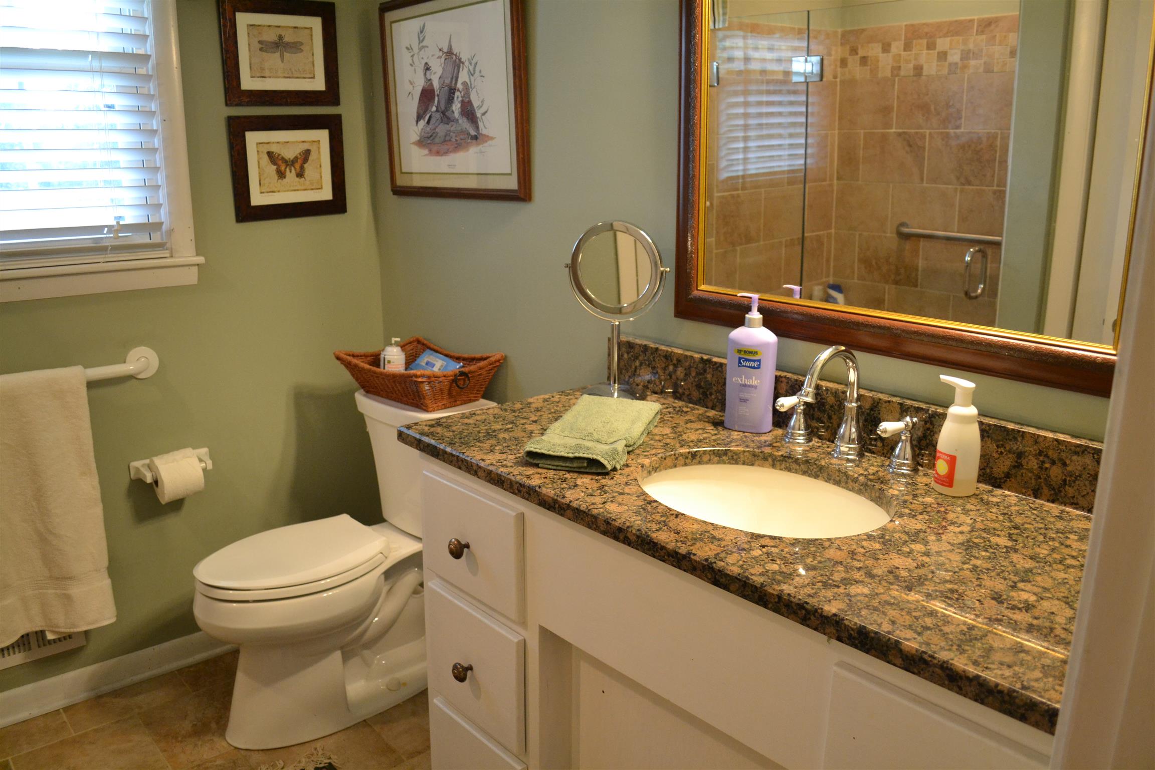 340 Eastover Road Lebanon, TN 37090 - Photo 16 of 20 HALL FULL BATH HAS HEATED TILE FLOORS; TUB SHOWER COMBO WITH MARBLE TOP VANITY AND