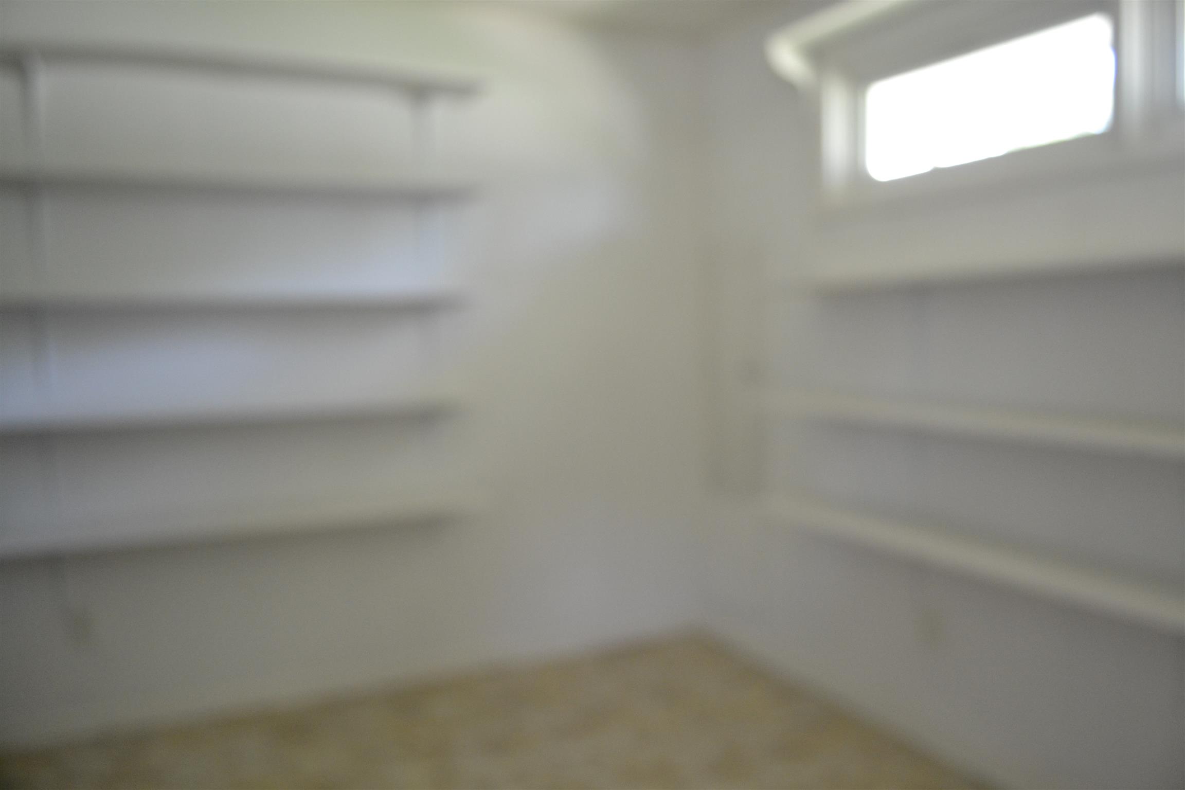 340 Eastover Road Lebanon, TN 37090 - Photo 18 of 20 THE GARAGE HAS ROOM FOR 1 VEHICLE ON ONE SIDE AND AN OFFICE ON THE OTHER SIDE. ; HAS RADIANT HEATED FLOOR, 220 PLUGS, GAS HOT WATER HEATER AND SINK
