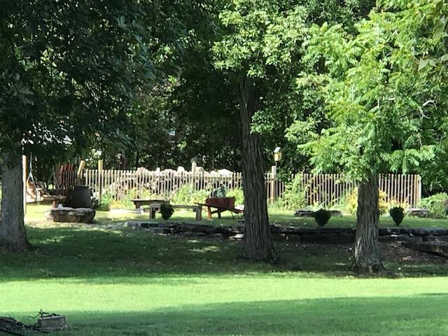340 Eastover Road Lebanon, TN 37090 - Photo 3 of 20 BEAUTIFUL BACKYARD WITH SETTING AREA TO VIEW THE 5.68 ACRES AND ALL THE MATURE TREES