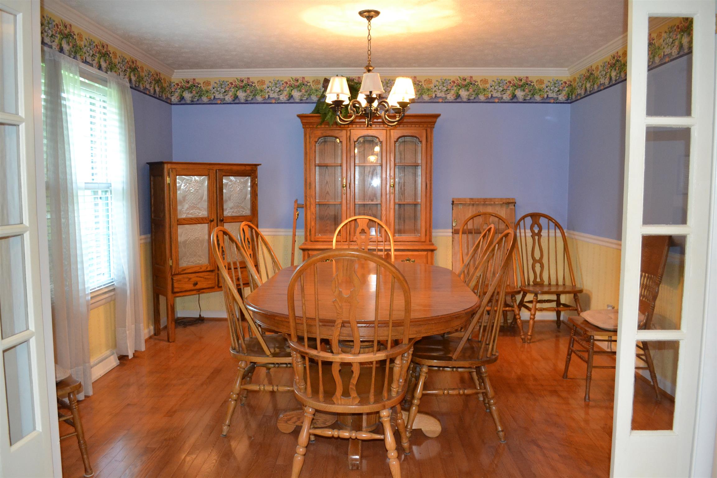 340 Eastover Road Lebanon, TN 37090 - Photo 8 of 20 FORMAL DINING ROOM WITH HARDWOOD FLOORS AND CHAIR RAIL ADJOINING THE KITCHEN AND LIVING ROOM;