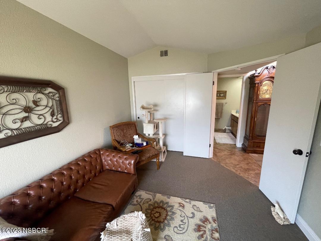 1108 Honeysuckle Way Lompoc, CA 93436 - Photo 11 of 54 a living room with furniture and a rug